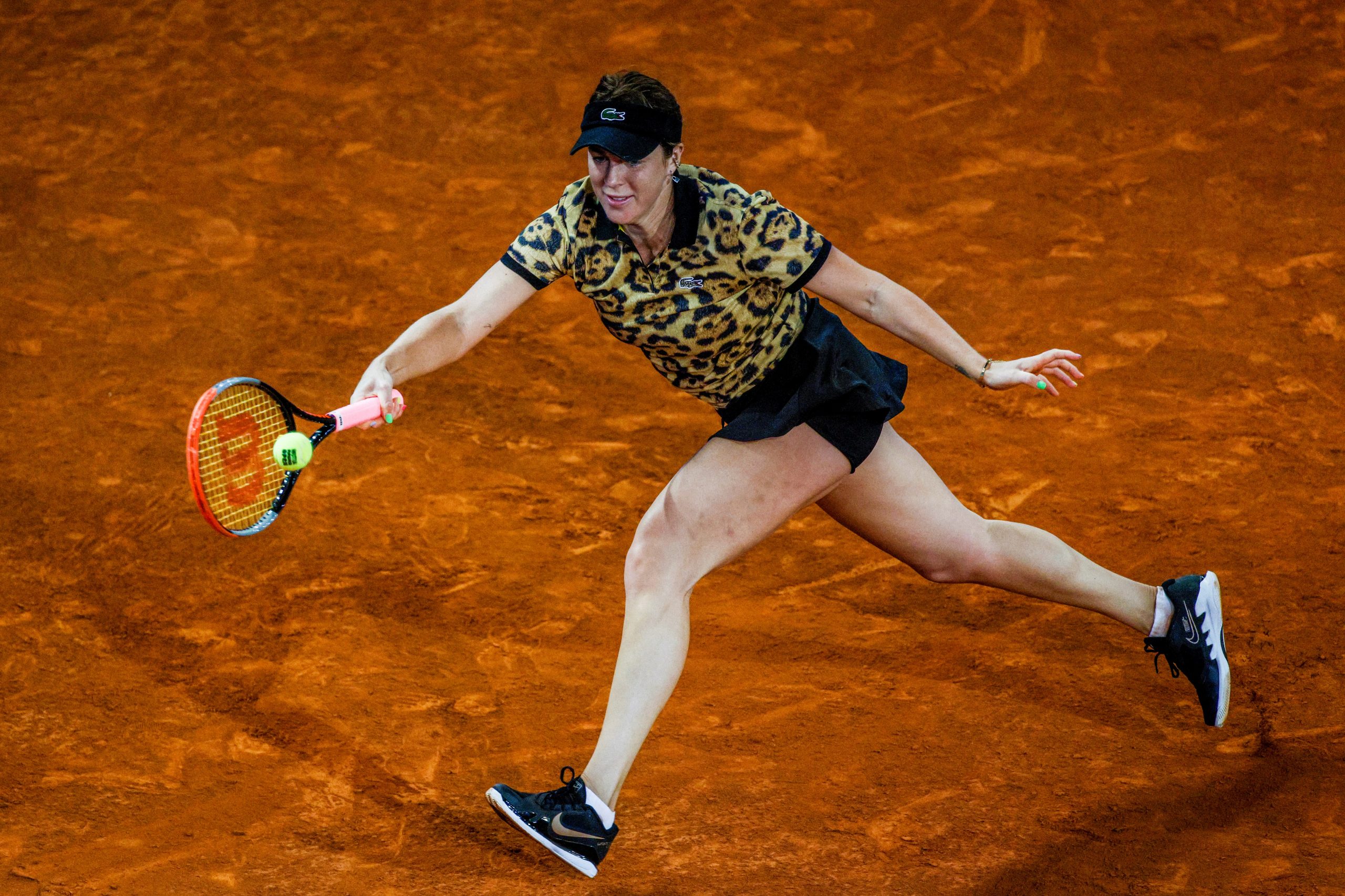 epa09181866 Anastasia Pavliuchenkova of Russia in action against Aryna Sabalenka of Belarus during their Mutua Madrid Open tennis tournament semi final match held in Madrid, central Spain, 06 May 2021.  EPA-EFE/JuanJo Martin