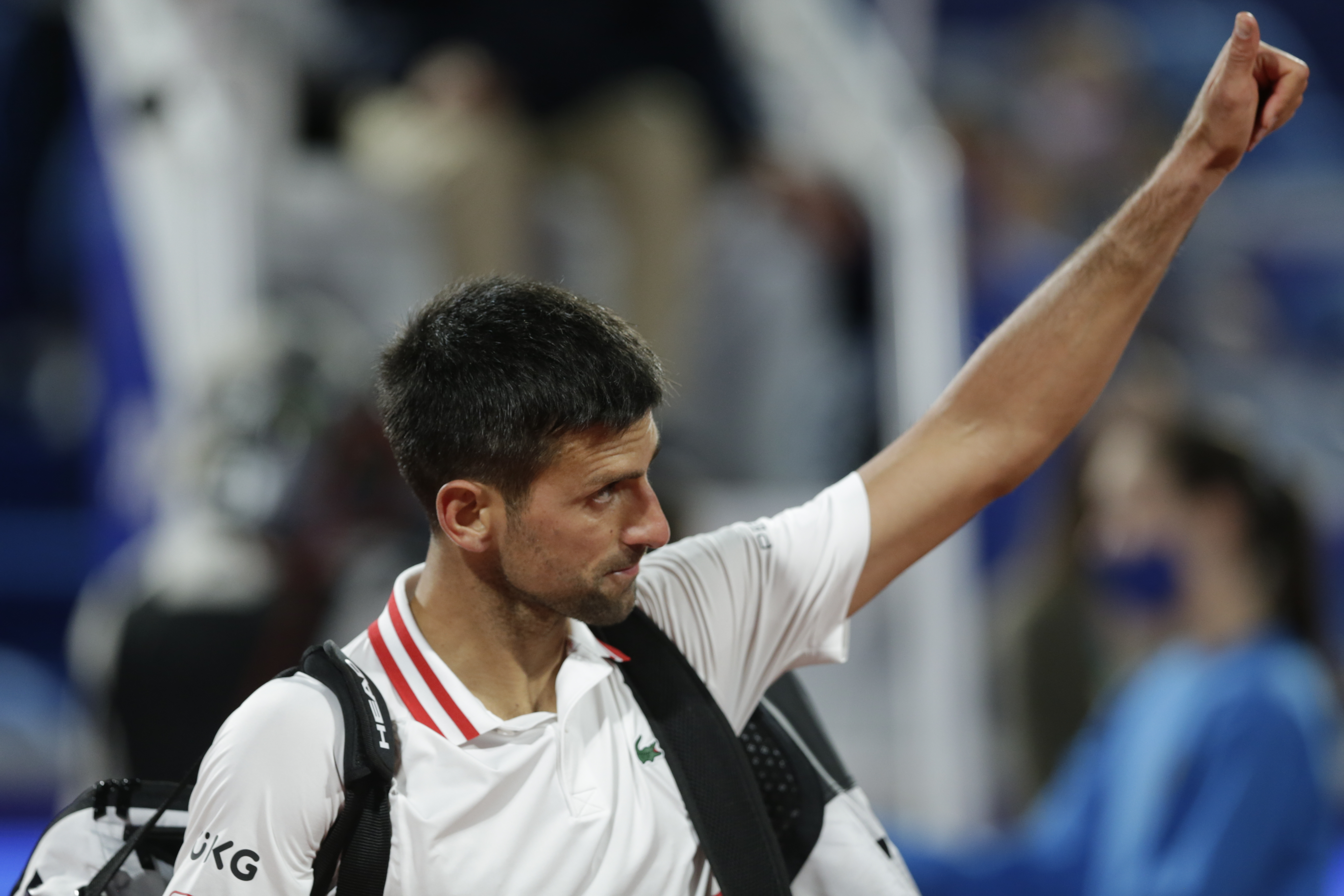 epa09157383 Novak Djokovic of Serbia reacts after his semi final match against Aslan Karatsev of Russia at the Serbia Open tennis tournament in Belgrade, Serbia, 24 April 2021.  EPA-EFE/ANDREJ CUKIC