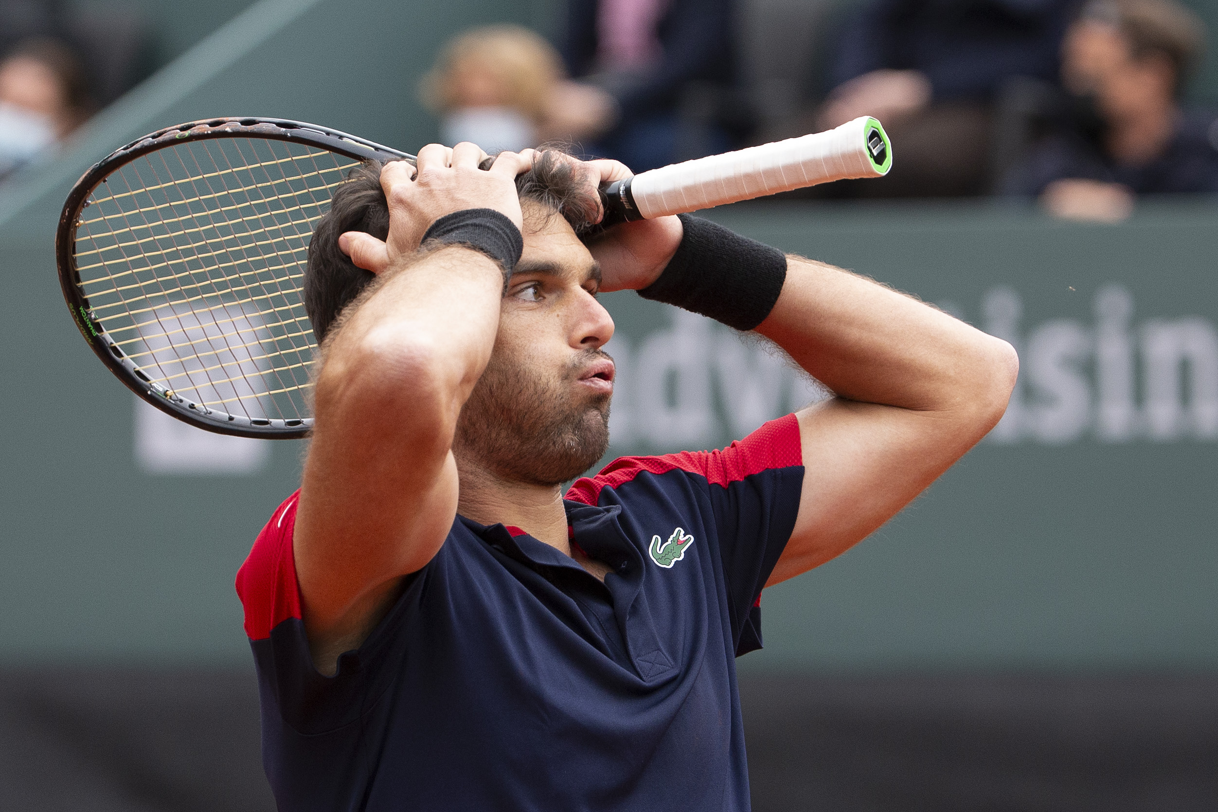 epa09209053 Pablo Andujar of Spain reacts after winning his second-round match against Roger Federer of Switzerland at the ATP 250 Geneva Open tennis tournament in Geneva, Switzerland, 18 May 2021.  EPA-EFE/SALVATORE DI NOLFI