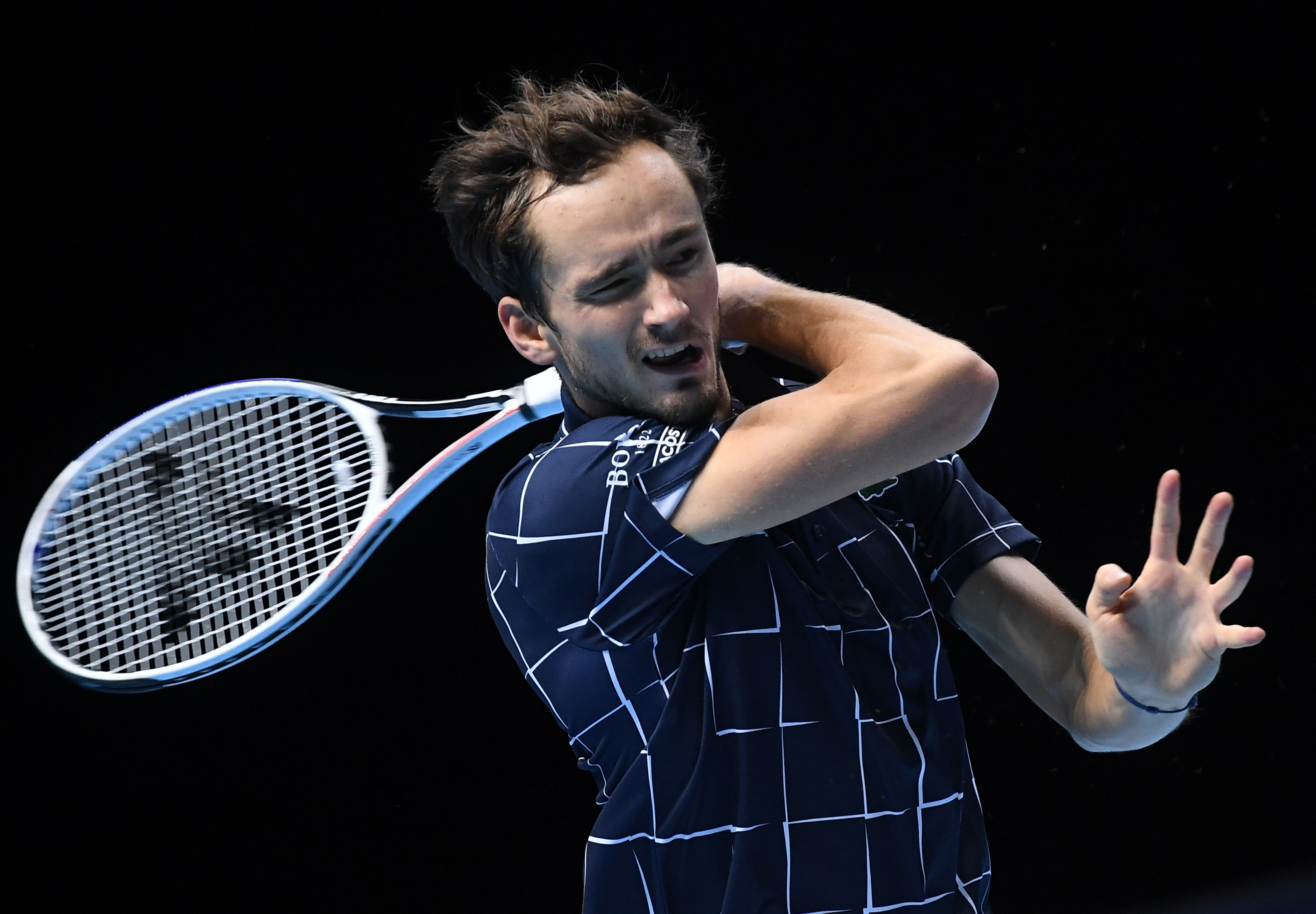 epa08832038 Daniil Medvedev of Russia in action against Diego Schwartzman of Argentina during their group stage match at the ATP Finals tennis tournament in London, Britain, 20 November 2020.  EPA-EFE/ANDY RAIN
