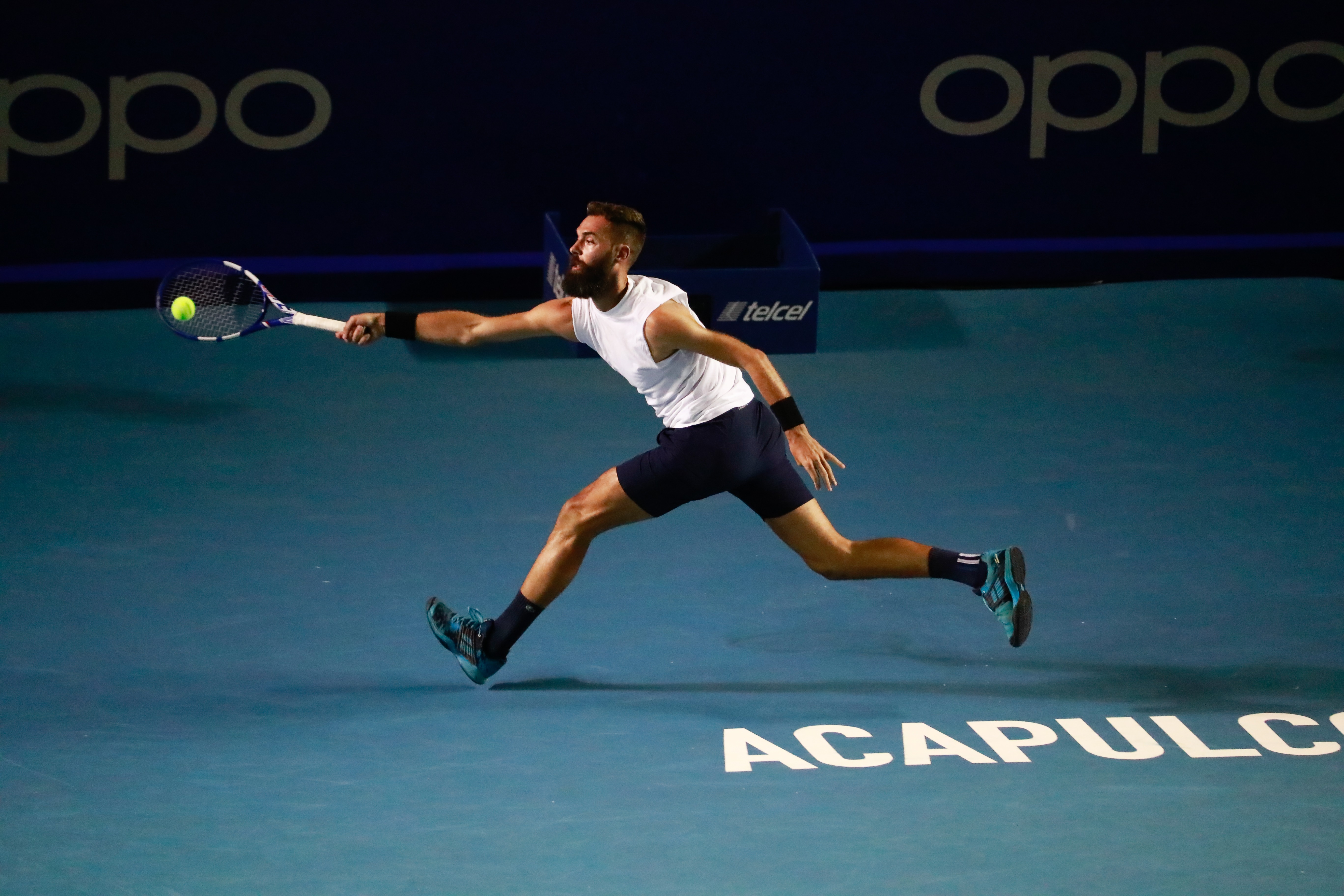 epa09079055 Benoit Paire of France in action against Stefanos Tsitsipas of Greece during the Mexican Tennis Open in Acapulco, Guerrero state, Mexico, 16 March 2021.  EPA-EFE/David Guzman