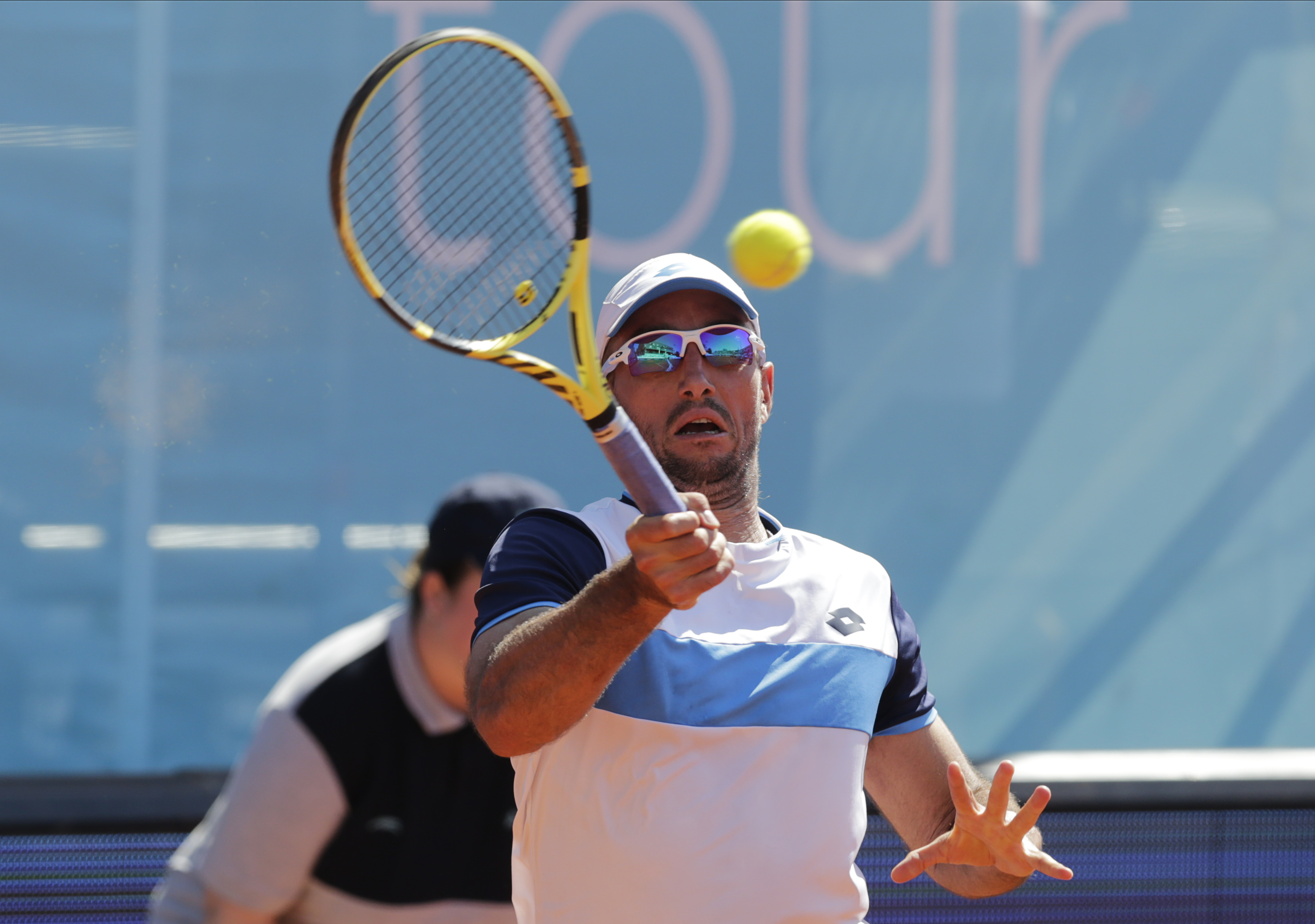 epa08484914 Viktor Troicki of Serbia returns the ball to Filip Krajinovic of Serbia during the Adria Tour tennis tournament in Belgrade, Serbia, 14 June 2020. The Adria Tour will be held until 05 July in a number of Balkan countries.  EPA-EFE/ANDREJ CUKIC