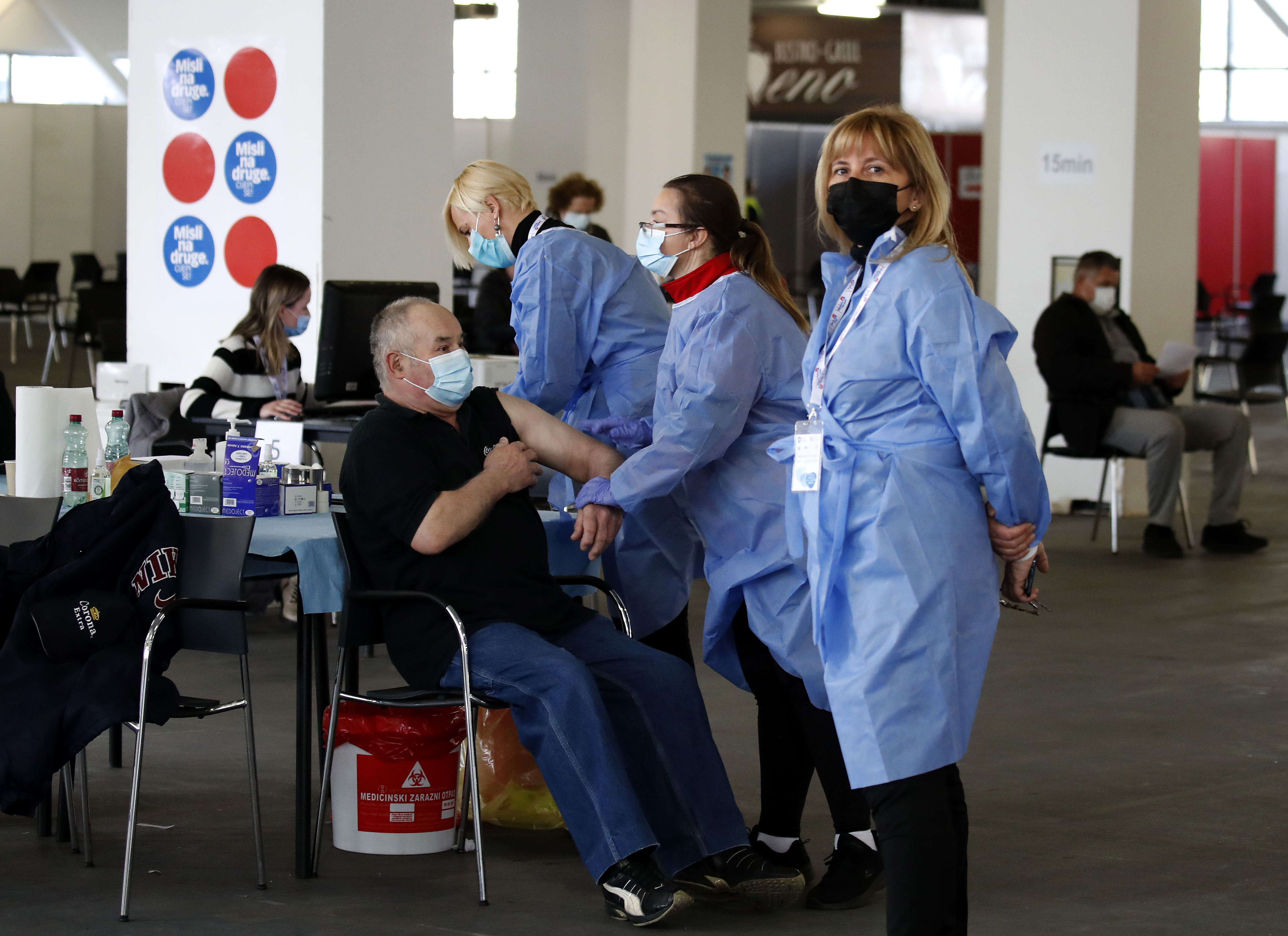 epa09120060 A man receives a dose of AstraZeneca COVID-19 vaccine on World Health Day, in Zagreb, Croatia, 07 April 2021.  EPA-EFE/ANTONIO BAT