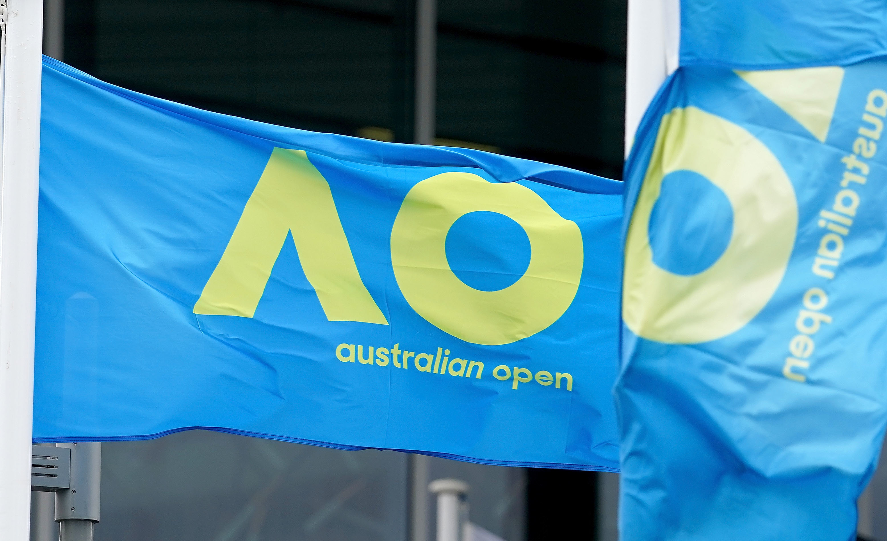 epa08972284 Australian Open flags are seen inside of Melbourne Park ahead of next months Australian Open tennis tournament, in Melbourne, Australia, 29 January 2021.  EPA-EFE/SCOTT BARBOUR AUSTRALIA AND NEW ZEALAND OUT