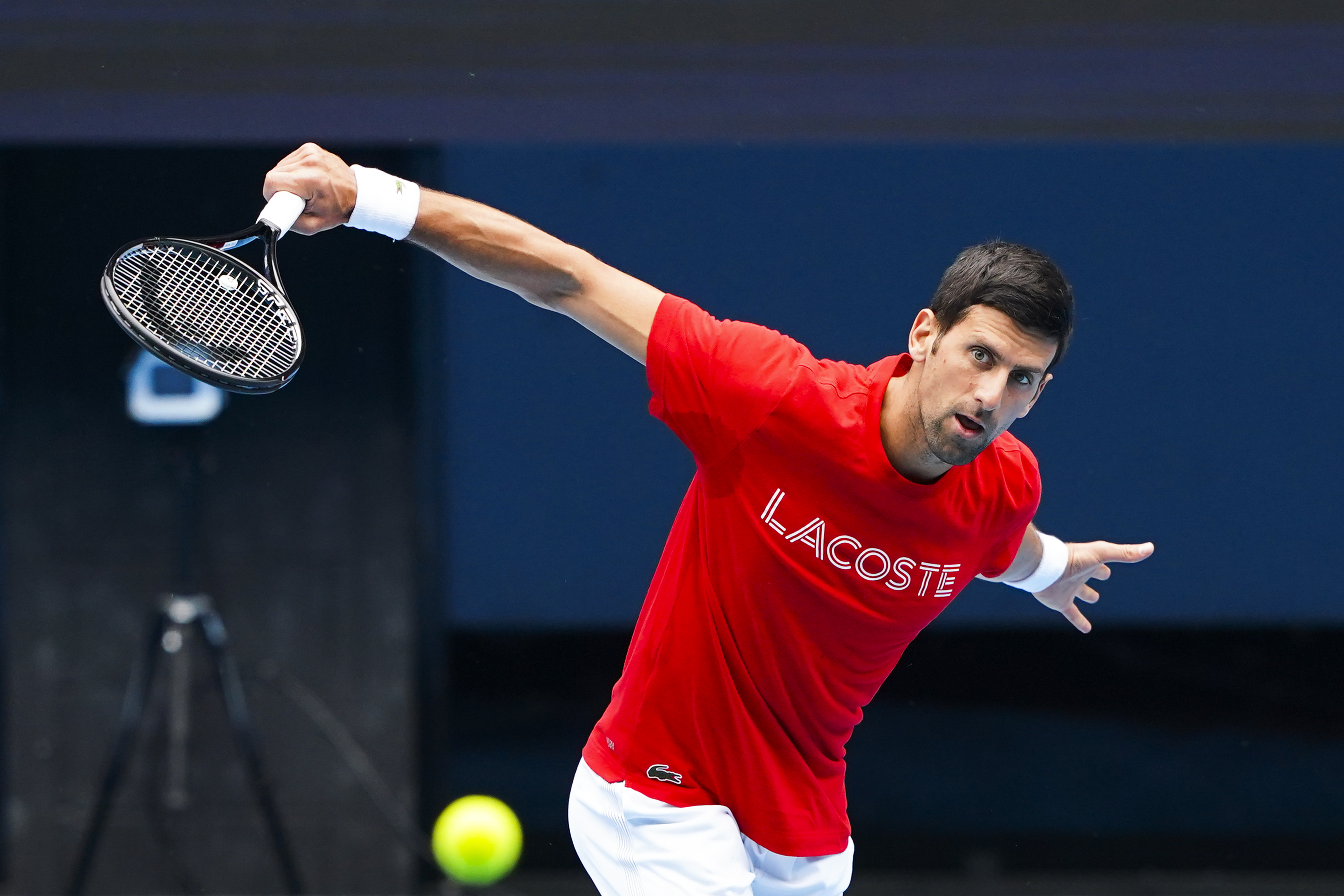 epa08978951 Novak Djokovic of Serbia in action during an Australian Open practice session at Melbourne Park in Melbourne, Australia, 01 February 2021.  EPA-EFE/DAVE HUNT AUSTRALIA AND NEW ZEALAND OUT  EDITORIAL USE ONLY