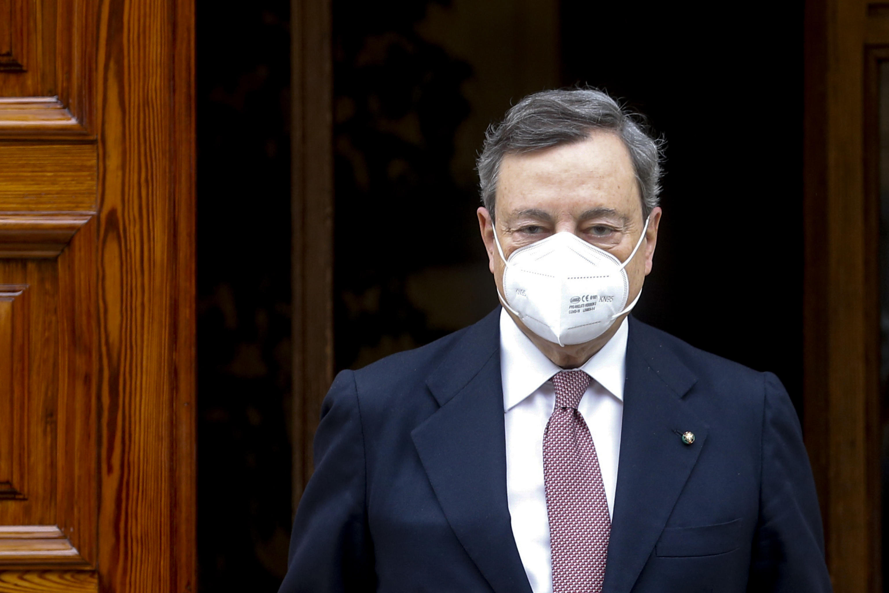 epa09008596 Italian Prime Minister designate Mario Draghi leaves his house as he heads to the Quirinal Palace for the swearing-in ceremony of his new government, in Rome, Italy, 13 February 2021.  EPA-EFE/FABIO FRUSTACI