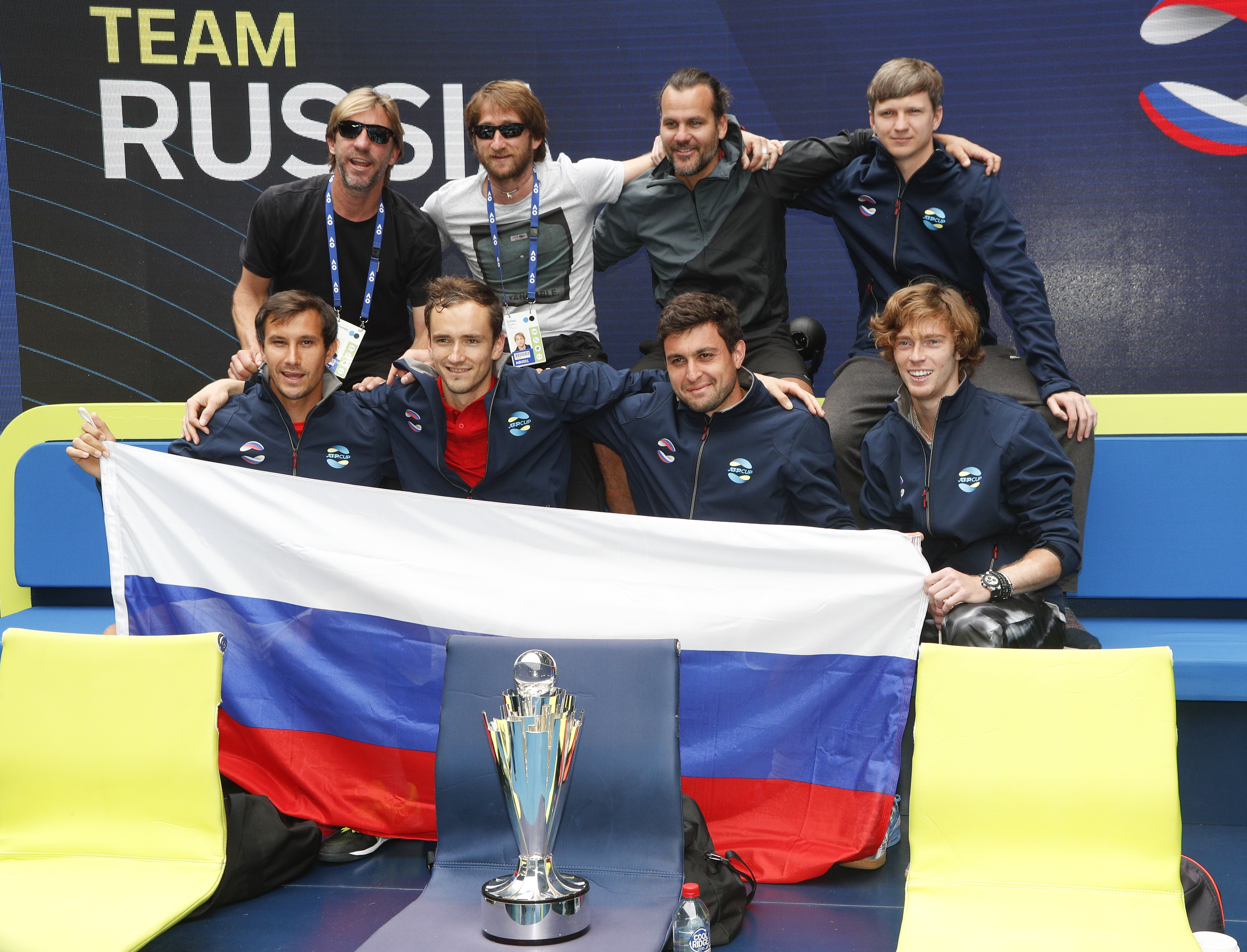 Russian team members pose for a photo after defeating Italy in ATP Cup final in Melbourne, Australia, Sunday, Feb. 7, 2021.(AP Photo/Hamish Blair)