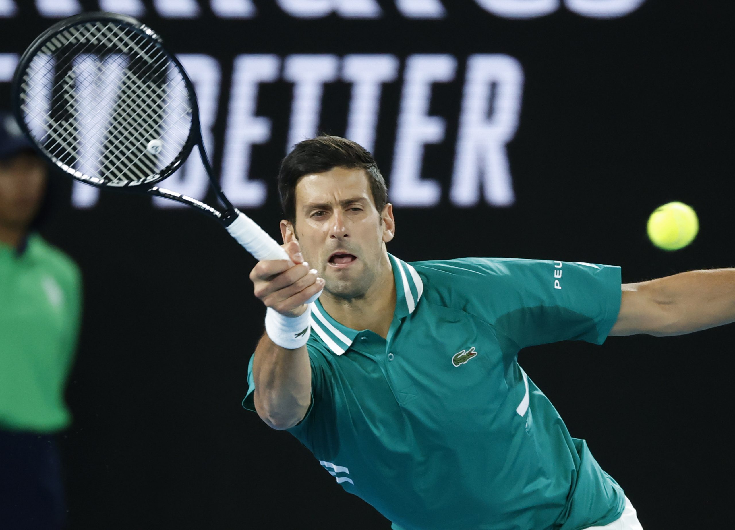 Serbia's Novak Djokovic makes a forehand return to France's Jeremy Chardy during their first round match at the Australian Open tennis championship in Melbourne, Australia, Monday, Feb. 8, 2021.(AP Photo/Rick Rycroft)