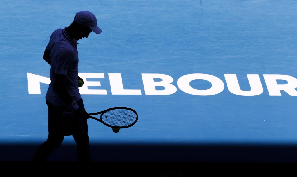 Serbia's Novak Djokovic prepares to serve to United States' Frances Tiafoe during their second round match at the Australian Open tennis championship in Melbourne, Australia, Wednesday, Feb. 10, 2021.(AP Photo/Rick Rycroft)