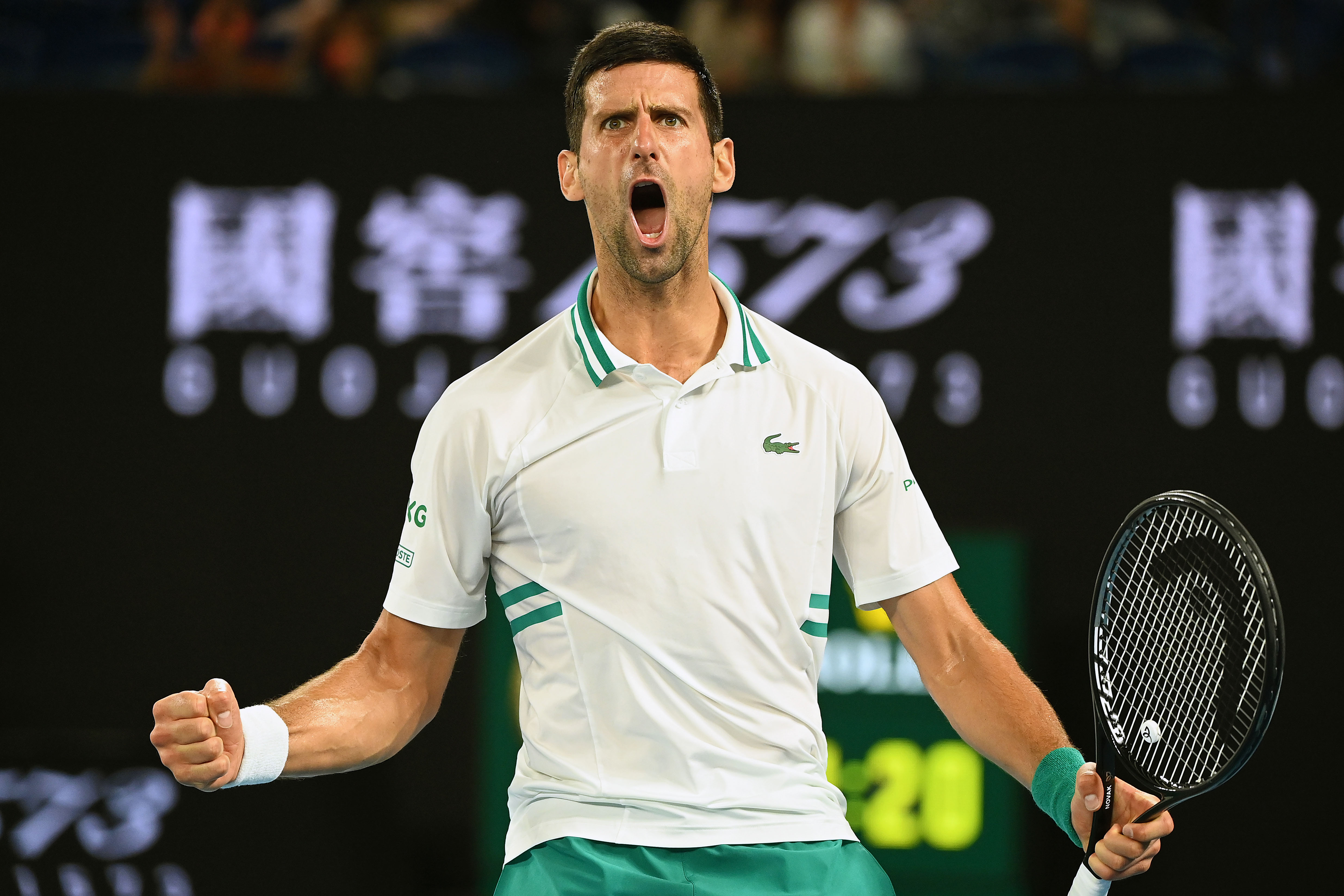 epa09020727 Novak Djokovic of Serbia reacts during his Men's singles semifinals match against Aslan Karatsev of Russia on Day 11 of the Australian Open at Melbourne Park in Melbourne, 18 February 2021.  EPA-EFE/DAVE HUNT AUSTRALIA AND NEW ZEALAND OUT