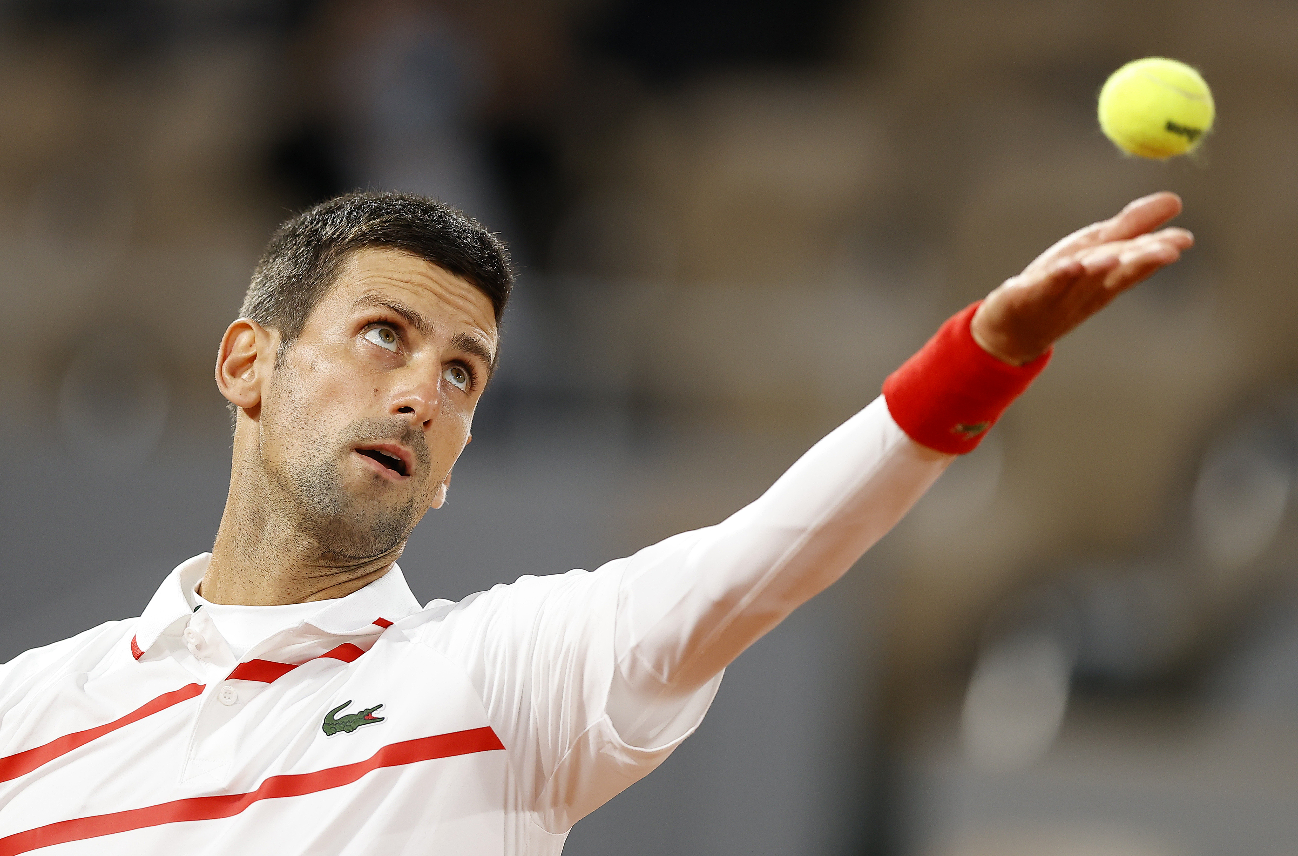 epa08705948 Novak Djokovic of Serbia serves during his first round match against Mikael Ymer of Sweden at the French Open tennis tournament at Roland Garros in Paris, France, 29 September 2020.  EPA-EFE/IAN LANGSDON