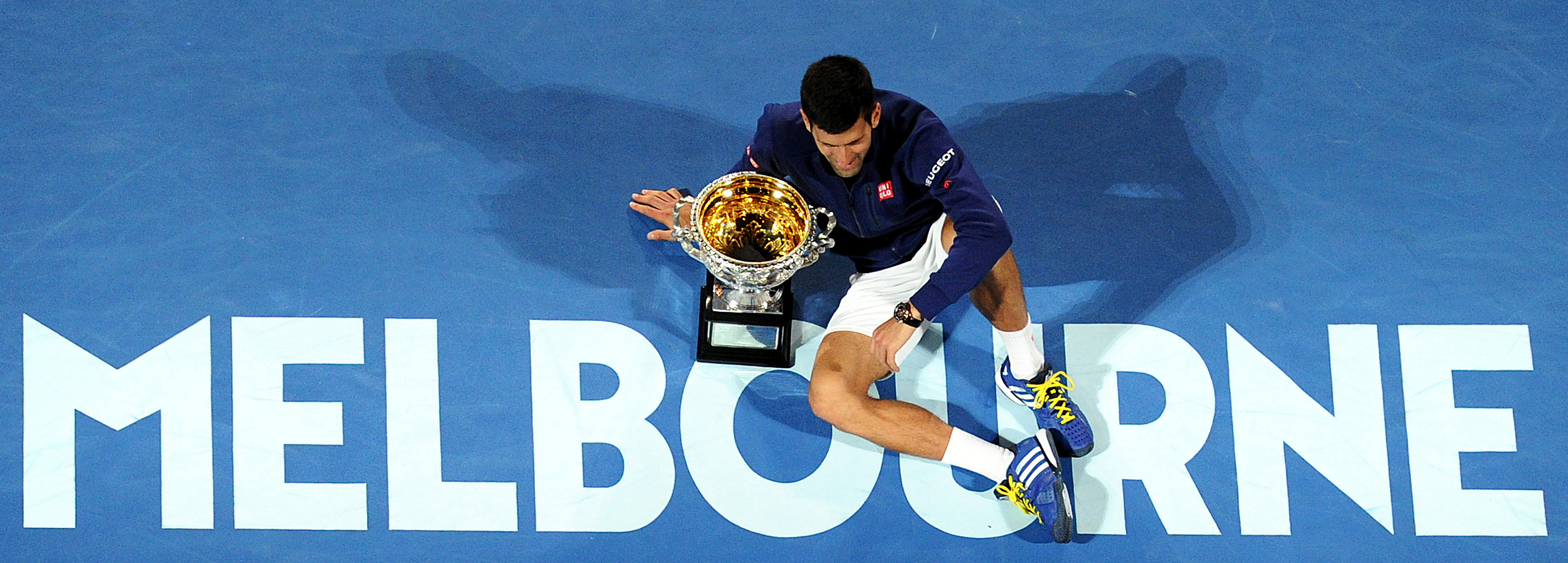 epa05137578 Novak Djokovic of Serbia celebrates his win against Andy Murray of the United Kingdom during the Men's final at the Australian Open tennis tournament in Melbourne, Australia, 31 January 2016.  EPA/JOE CASTRO AUSTRALIA AND NEW ZEALAND OUT