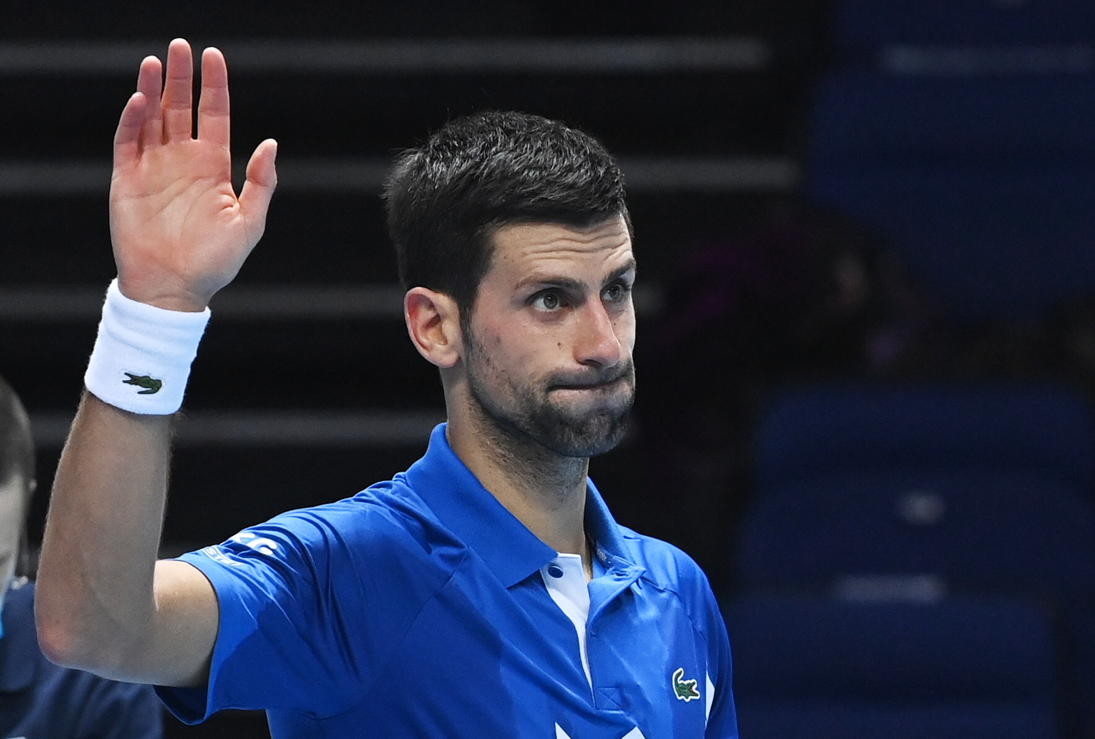 epa08823929 Novak Djokovic of Serbia celebrates after winning his group stage match against Diego Schwartzman of Argentina at the ATP Finals in London, Britain, 16 November 2020.  EPA-EFE/ANDY RAIN