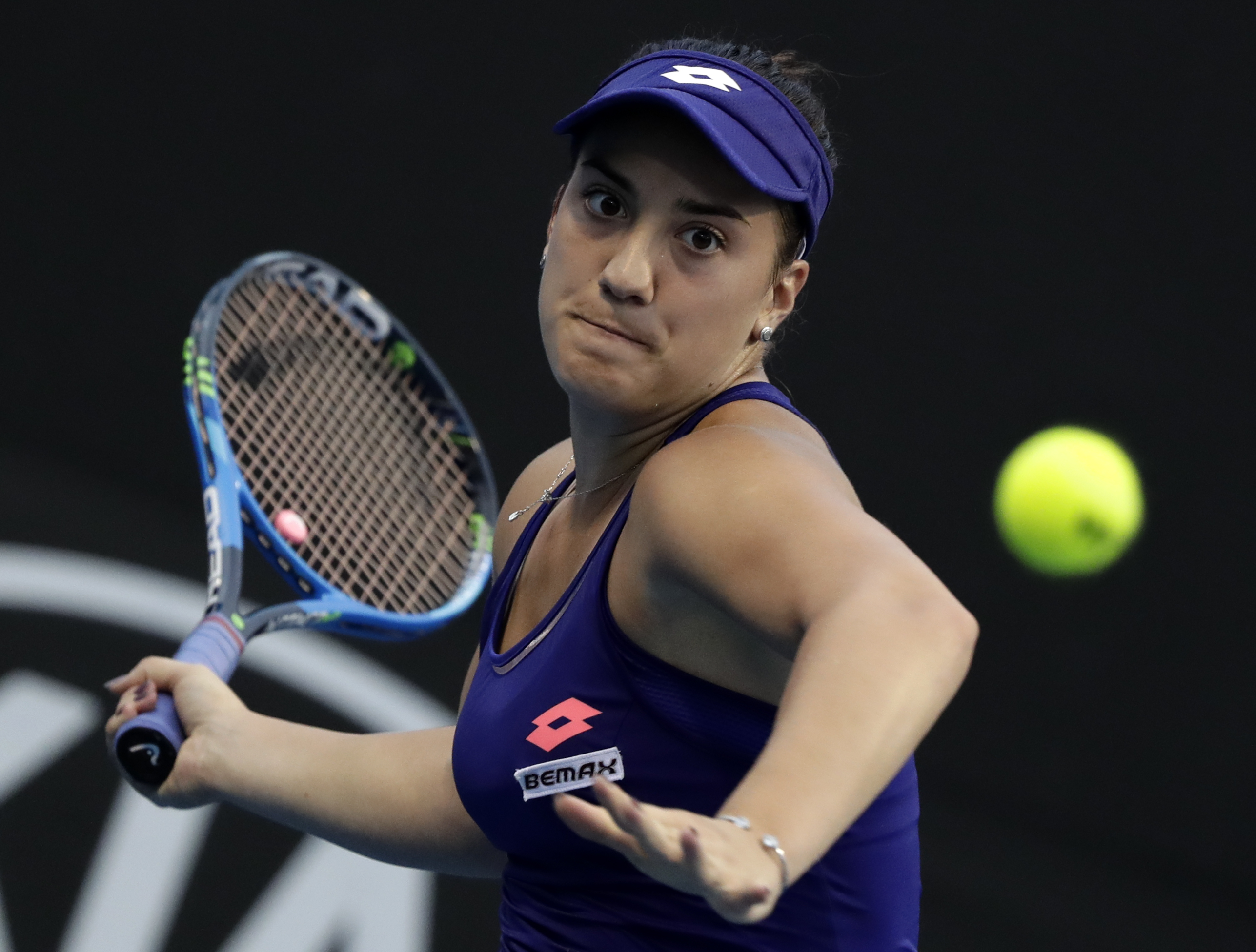 epa05730616 Danka Kovinic of Montenegro in action against Timea Bacsinszky of Switzerland during round two of the Women's Singles at the Australian Open Grand Slam tennis tournament in Melbourne, Victoria, Australia, 19 January 2017.  EPA/MARK R. CRISTINO