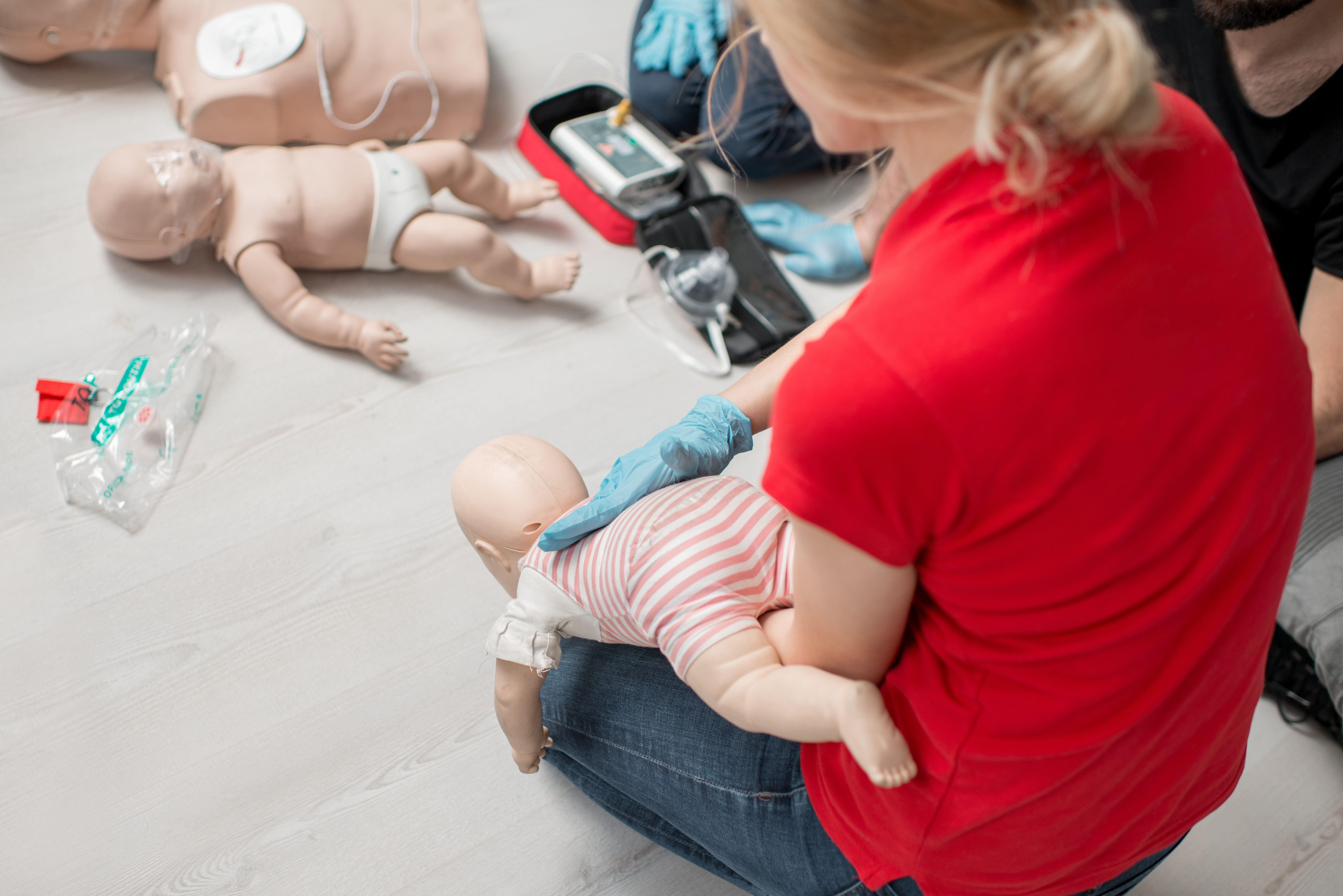 Instructor,Showing,How,To,Safe,A,Life,When,The,Baby