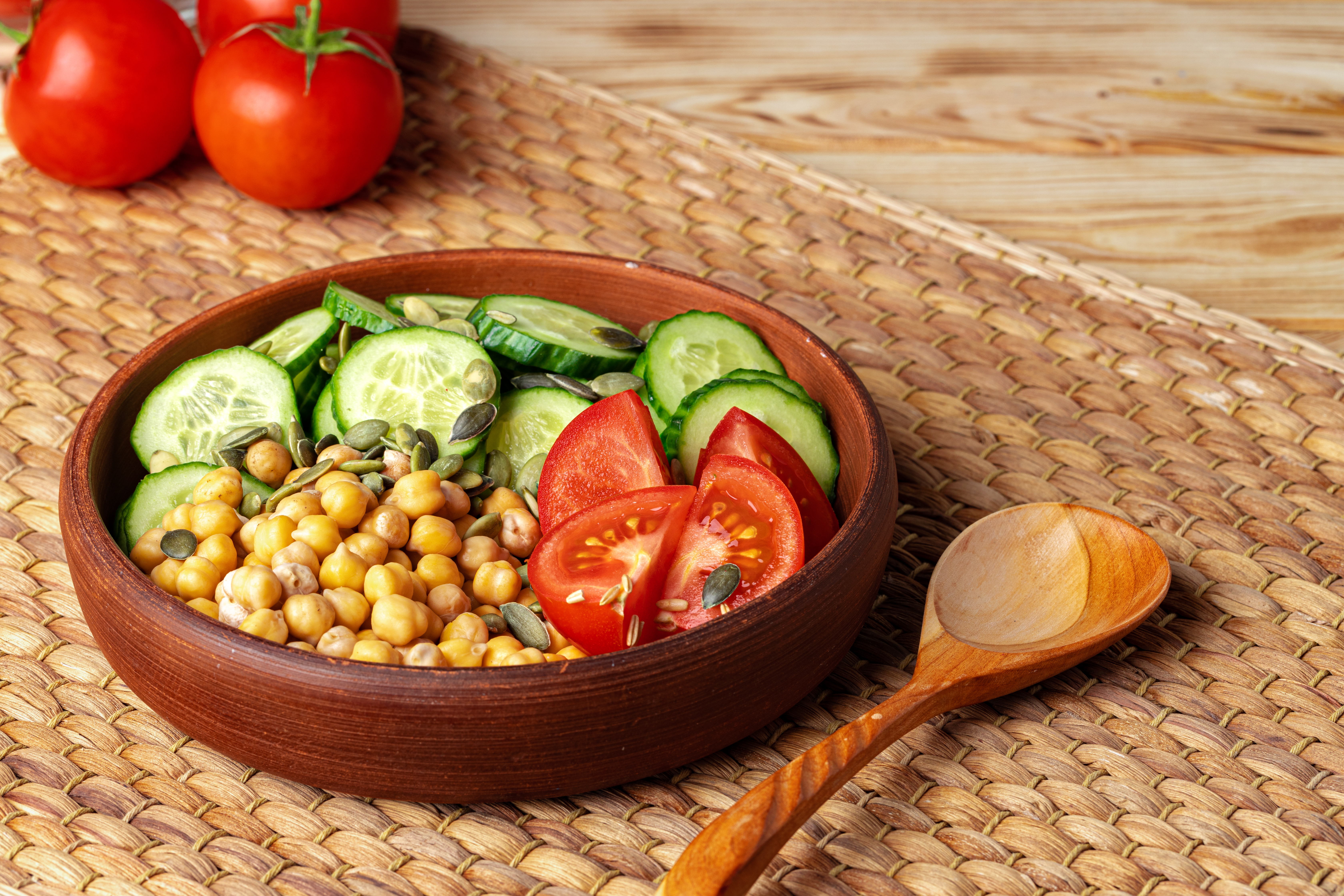 Clay,Plate,Of,Chickpeas,And,Cut,Cucumbers,And,Tomatoes.,Healthy