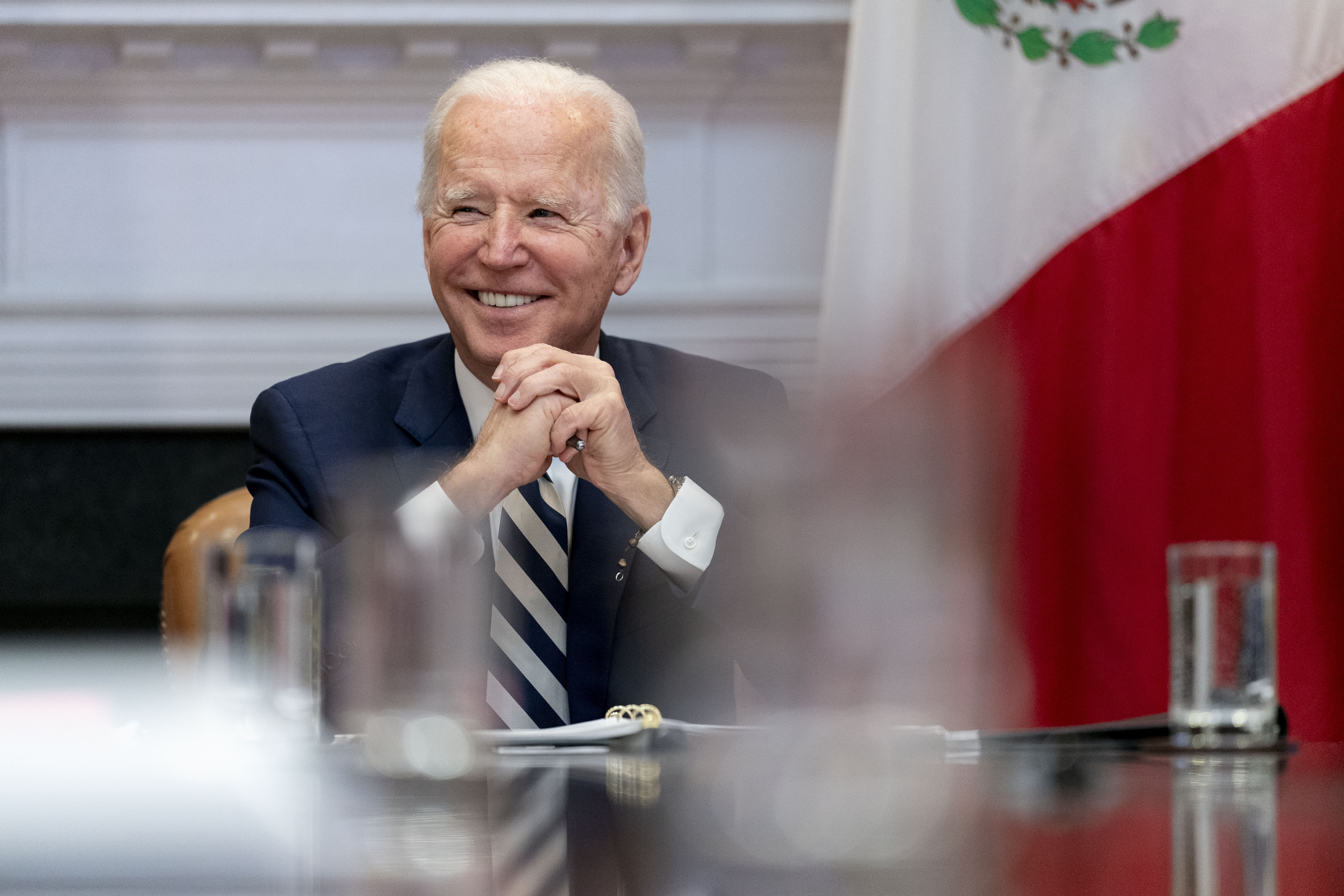 President Joe Biden attends a virtual meeting with Mexican President Andres Manuel Lopez Obrador, in the Roosevelt Room of the White House, Monday, March 1, 2021, in Washington. (AP Photo/Andrew Harnik)