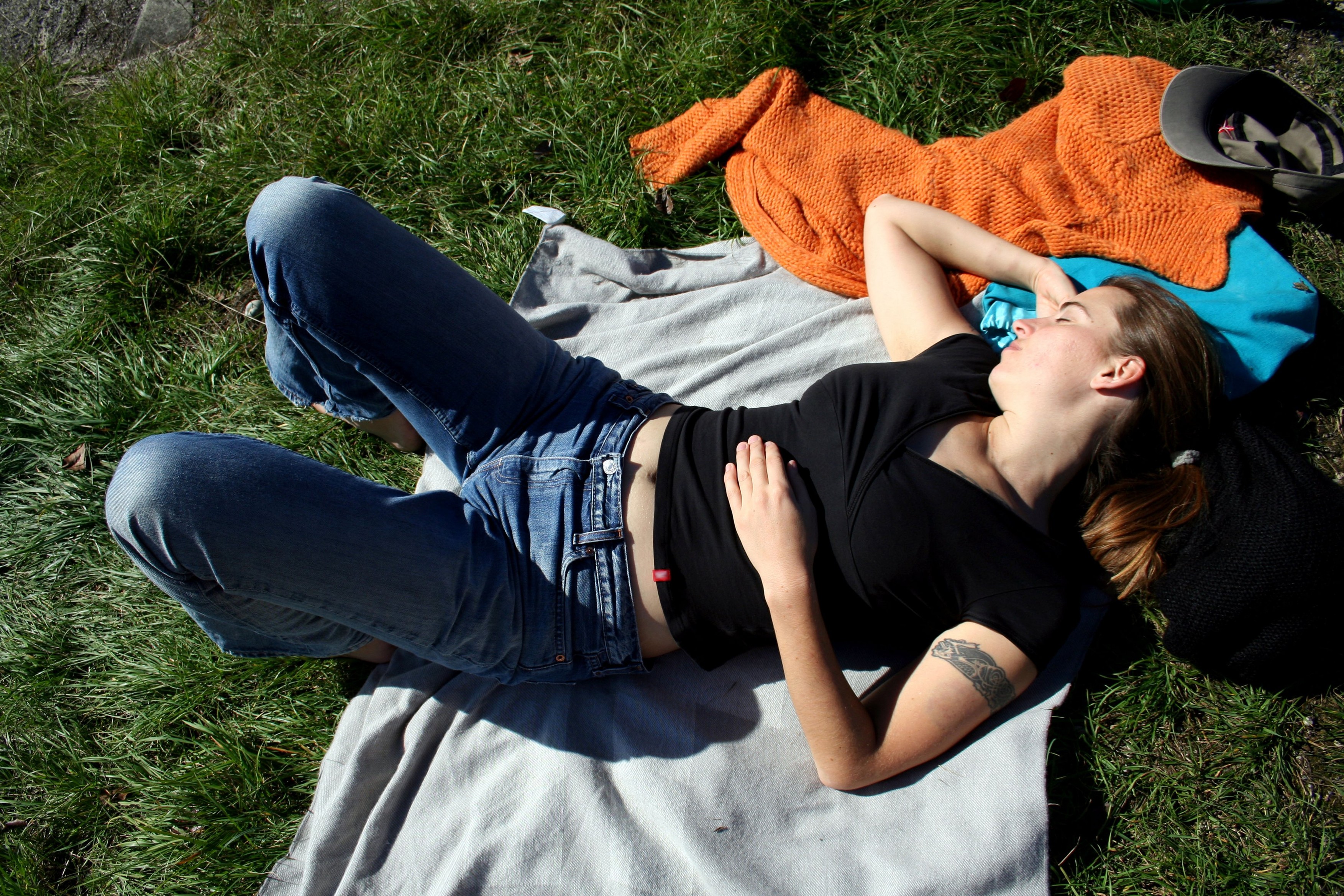 lady resting in grass