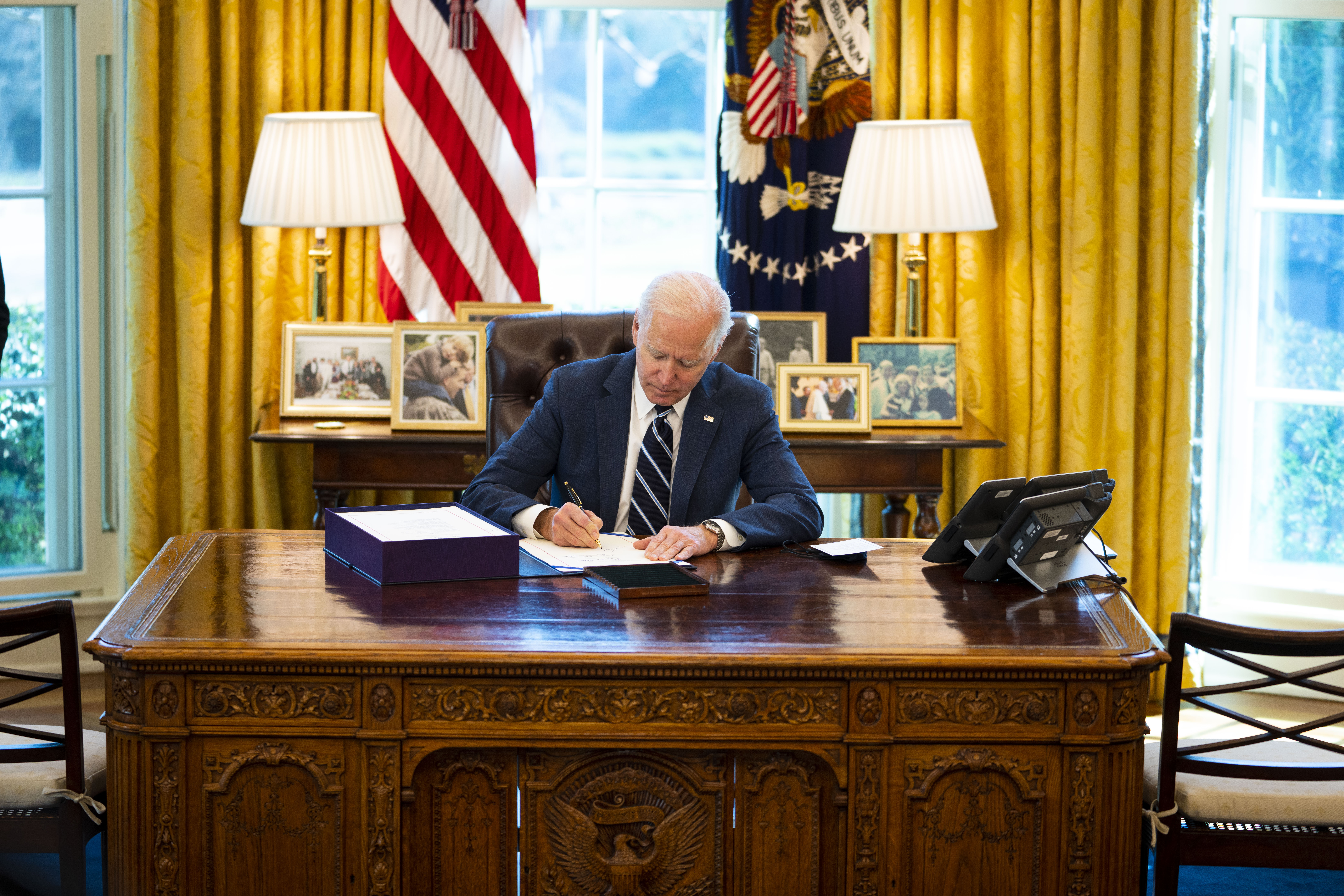 US President Joe Biden signs the American Rescue Plan