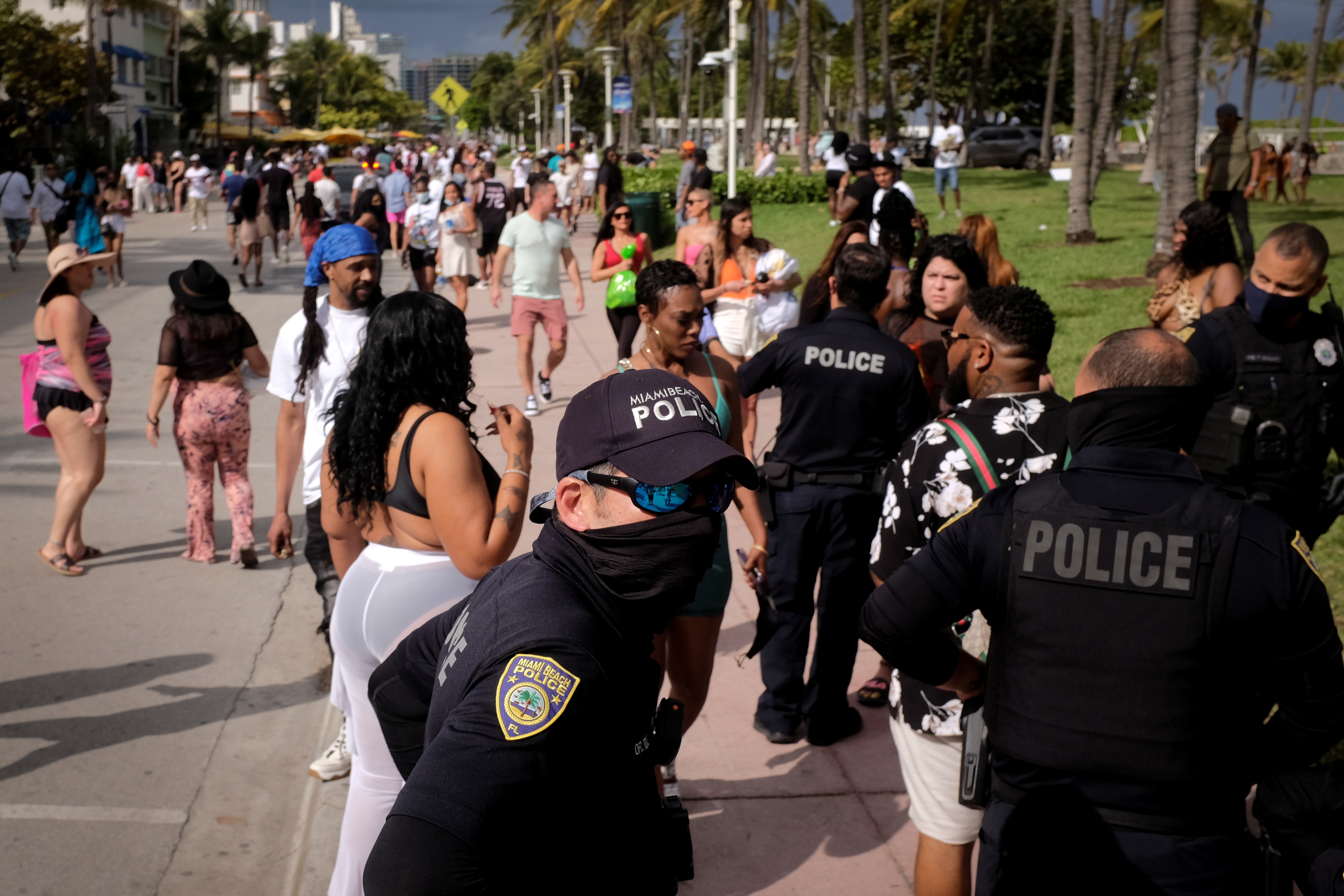 Miami Beach police officers attend an emergency in Ocean Drive during spring break festivities, amid the coronavirus disease (COVID-19) outbreak in Miami Beach, Florida, U.S., March 6, 2021. REUTERS/Marco Bello