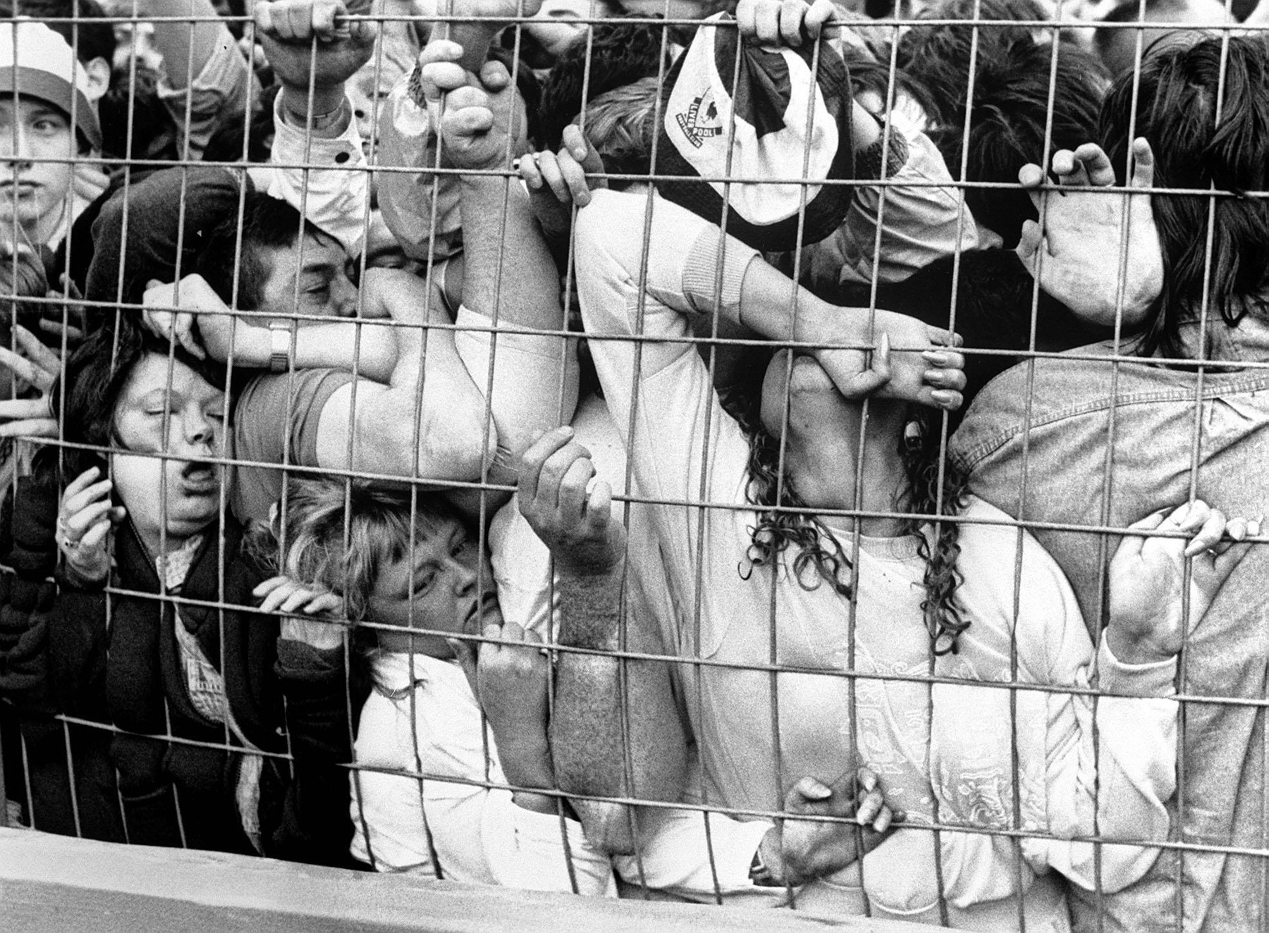 File photo dated 15/04/1989 of Fans being crushed against the fence in the Liverpool enclosure at Hillsborough.,Image: 190138464, License: Rights-managed, Restrictions: FILE PHOTO, Model Release: no, Credit line: David Giles / PA Images / Profimedia