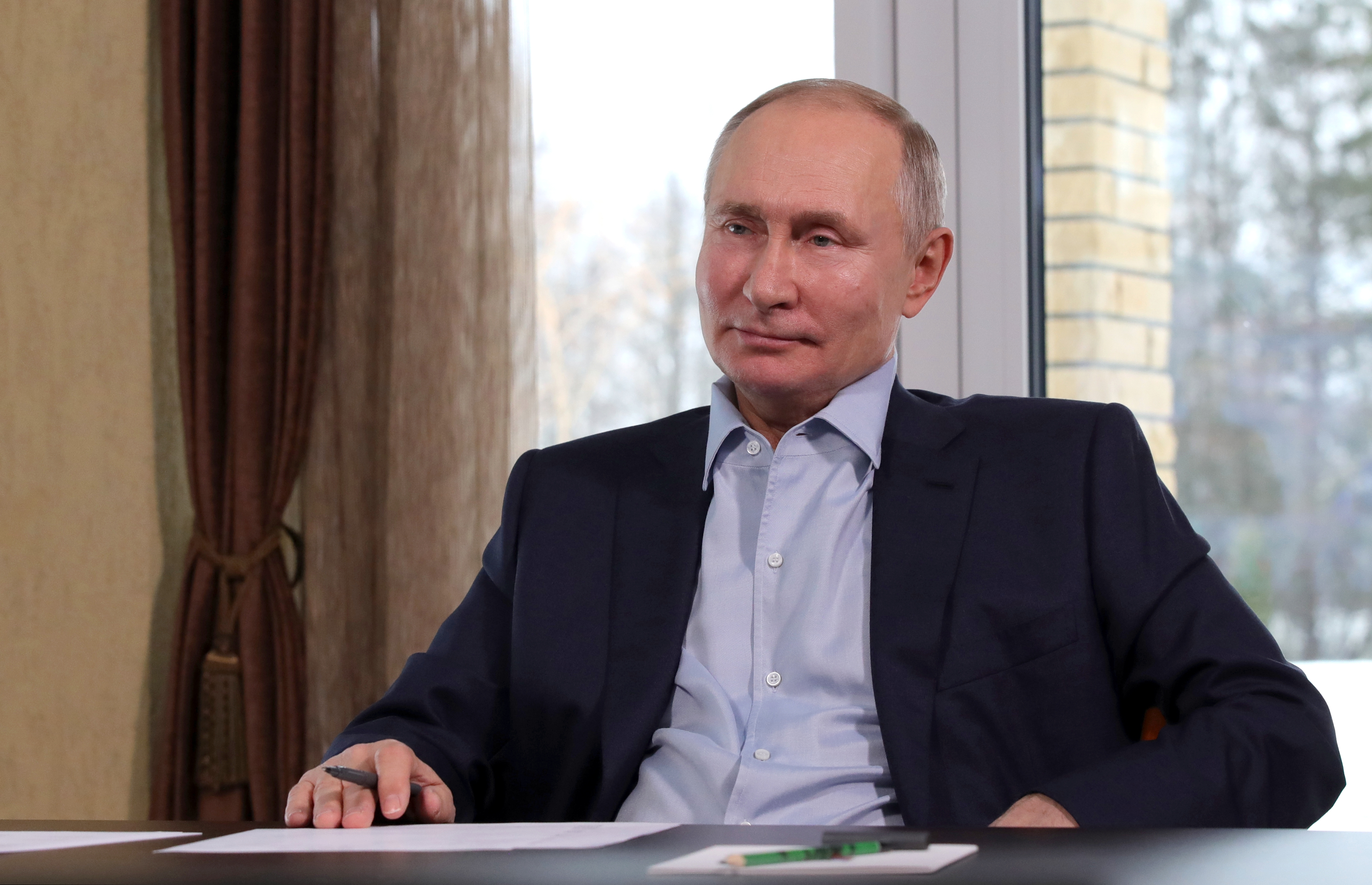 Russia President Putin attends teleconference with university students to mark Russian Students' Day