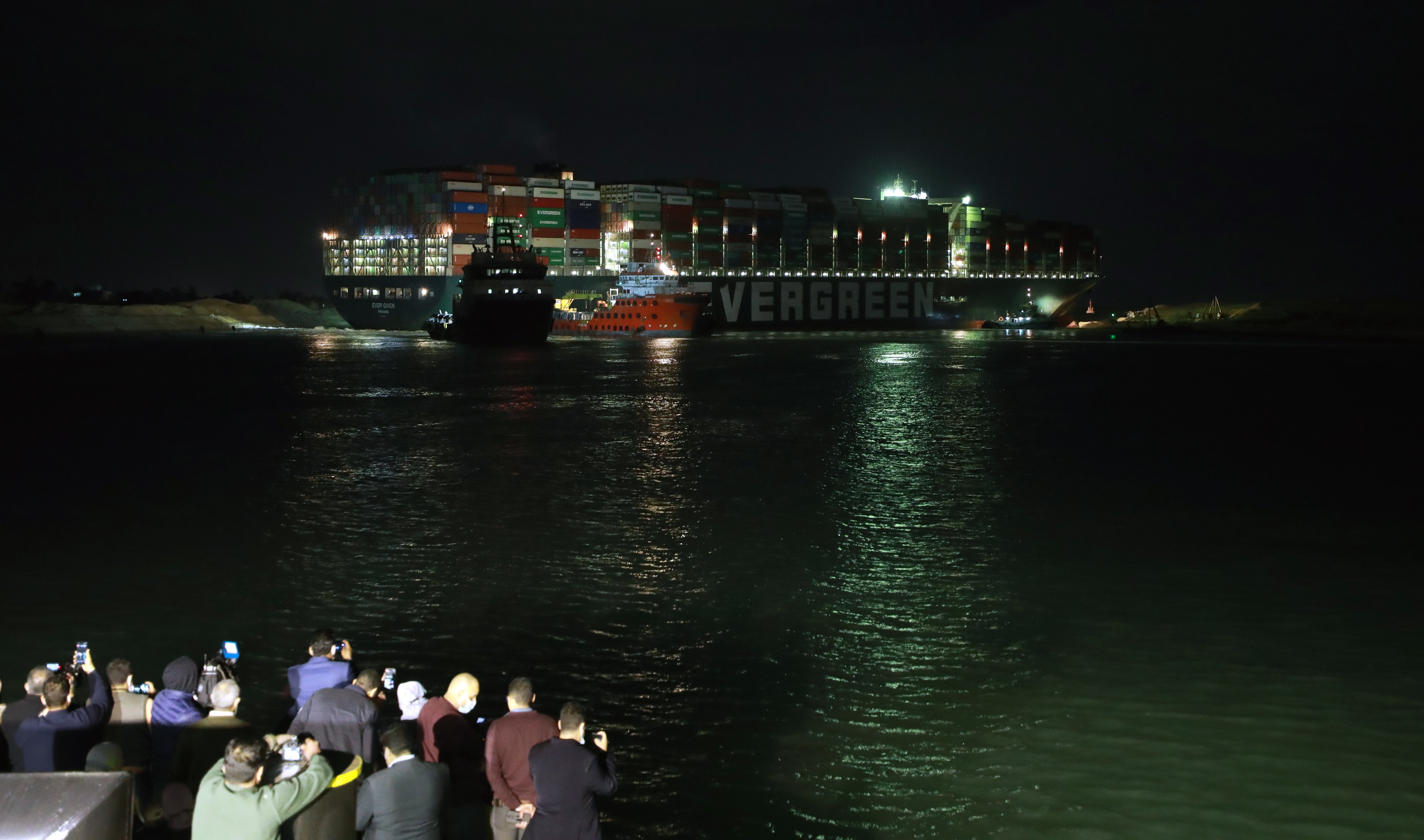 Suez Canal blocked as container ship runs aground