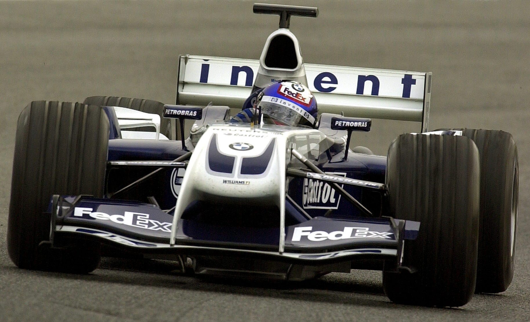 Juan Pablo Montoya of Colombia at the wheel of a Williams BMW during free trials at Montmelo, near Barcelona, on Wednesday, 04 February 2004.  EPA/Andreu Dalmau