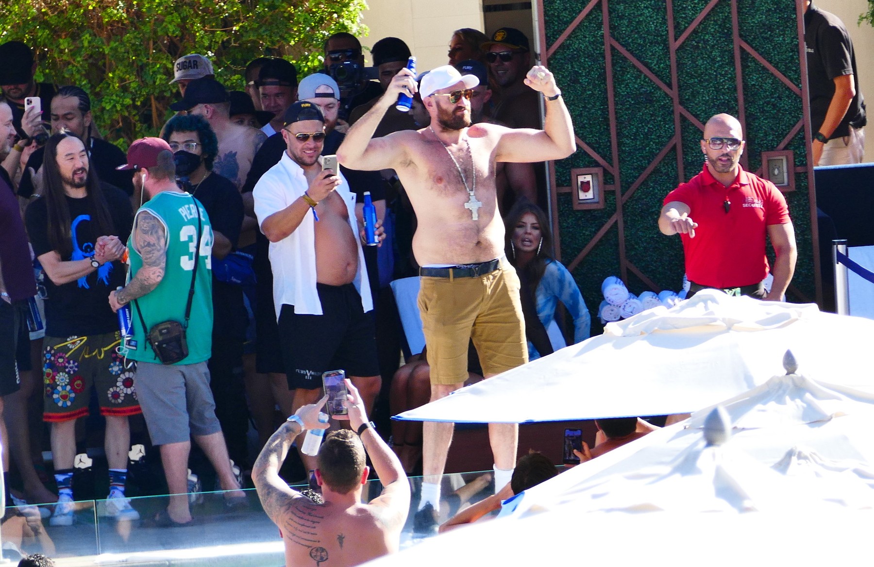 EXCLUSIVE: Tyson Fury has fun with Steve Aoki and his family and friends as they all party and celebrate in his VIP cabana after winning boxing match in Las Vegas