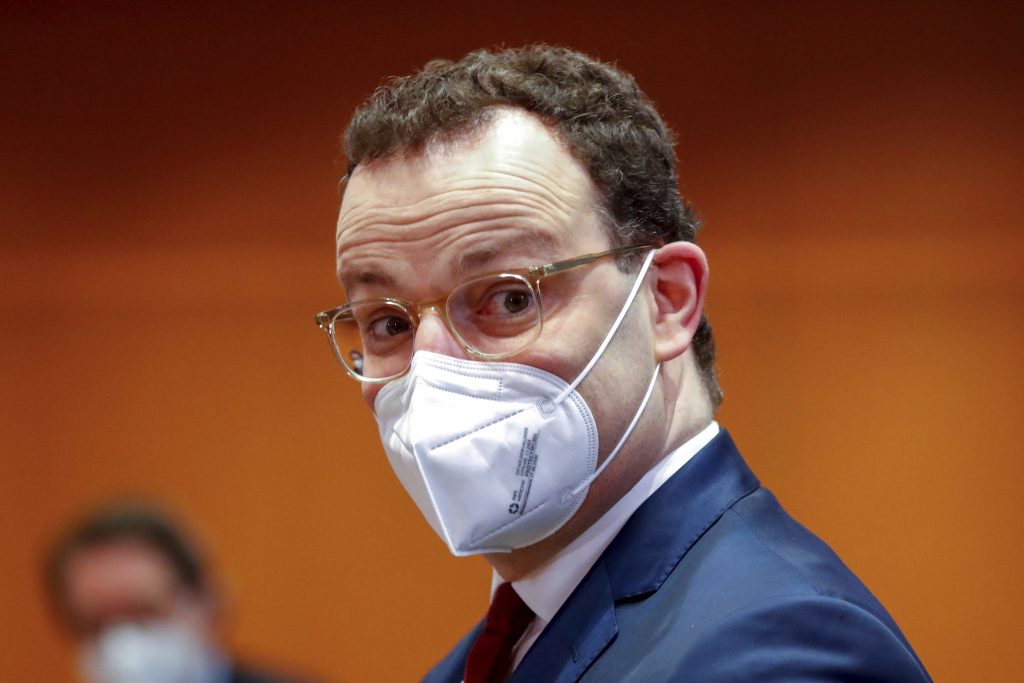 German Health Minister Jens Spahn wears a protective masks as he attends the weekly cabinet meeting at the Chancellery in Berlin, Germany, January 20, 2021. (Fabrizio Bensch/Pool via AP)