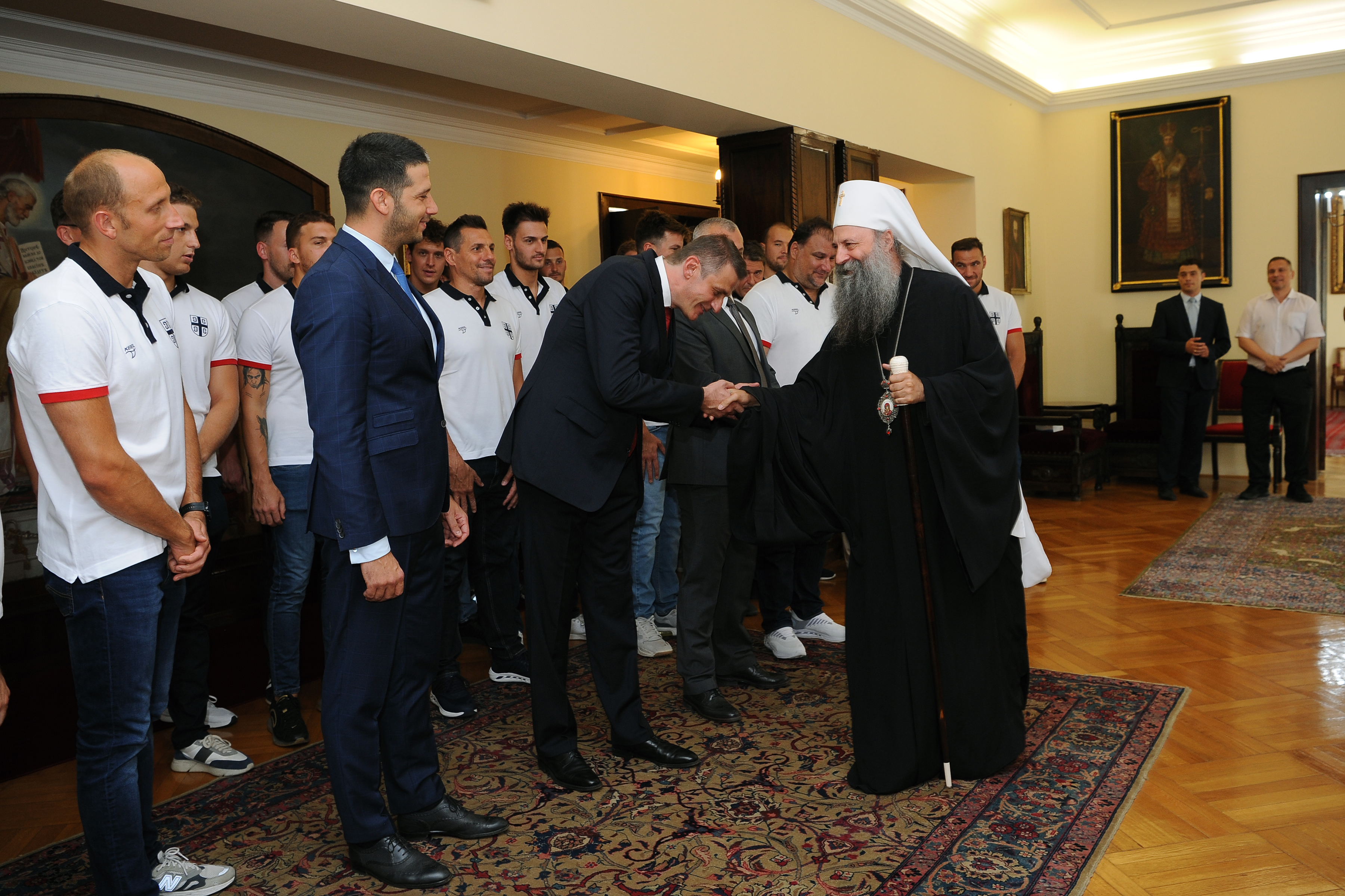 Beograd, 9. juli 2021 - Ministar omladine i sporta Vanja Udovicic,  generalni sekretar vaterpolo saveza Viktor Jelenic. Patrijarh srpski Porfirije primio je danas u Patrijarsiji vaterpolo Olimpijski tim Srbije. FOTO TANJUG/ MILOS MILIVOJEVIC/bs