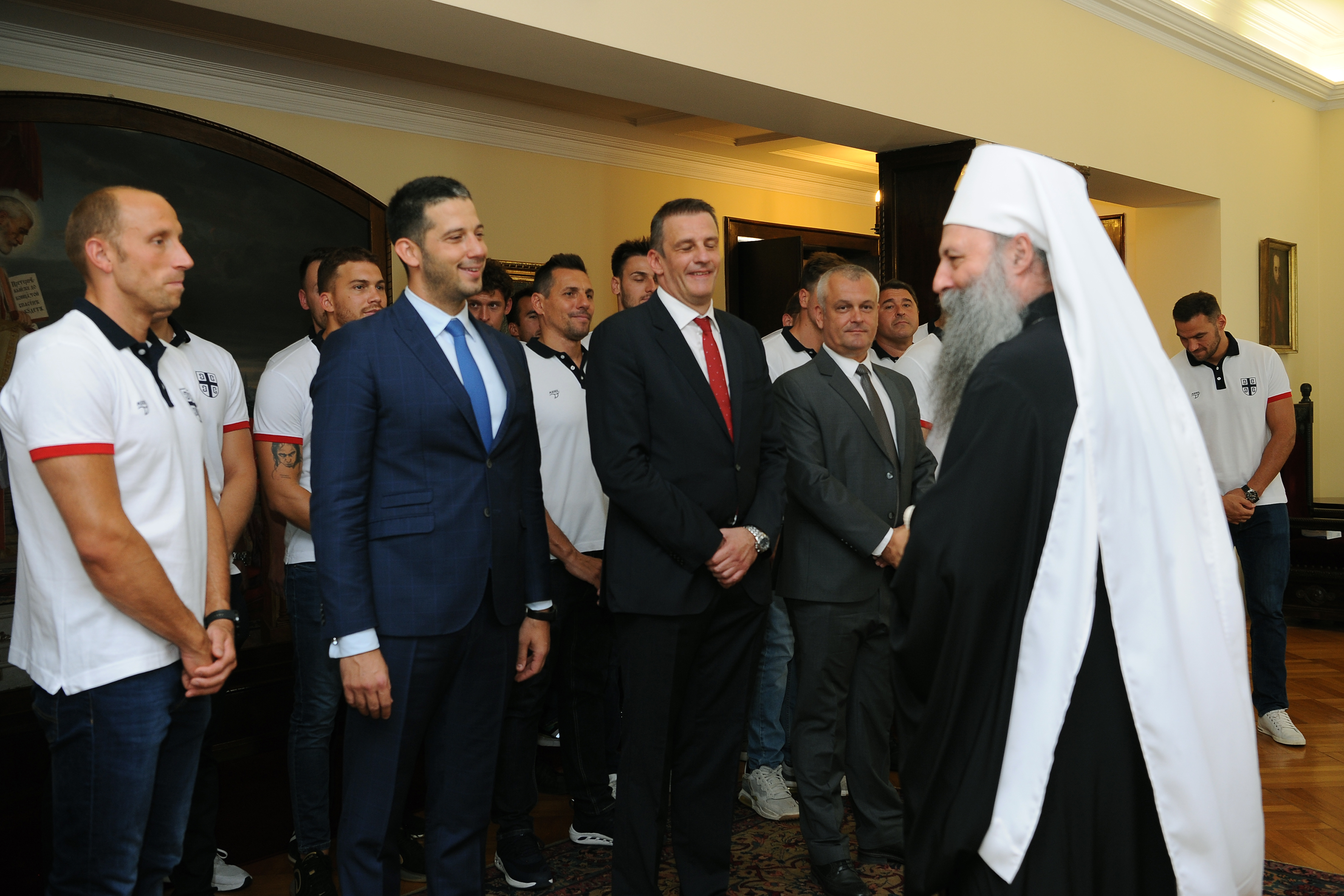 Beograd, 9. juli 2021 - Ministar omladine i sporta Vanja Udovicic,  generalni sekretar vaterpolo saveza Viktor Jelenic. Patrijarh srpski Porfirije primio je danas u Patrijarsiji vaterpolo Olimpijski tim Srbije. FOTO TANJUG/ MILOS MILIVOJEVIC/bs