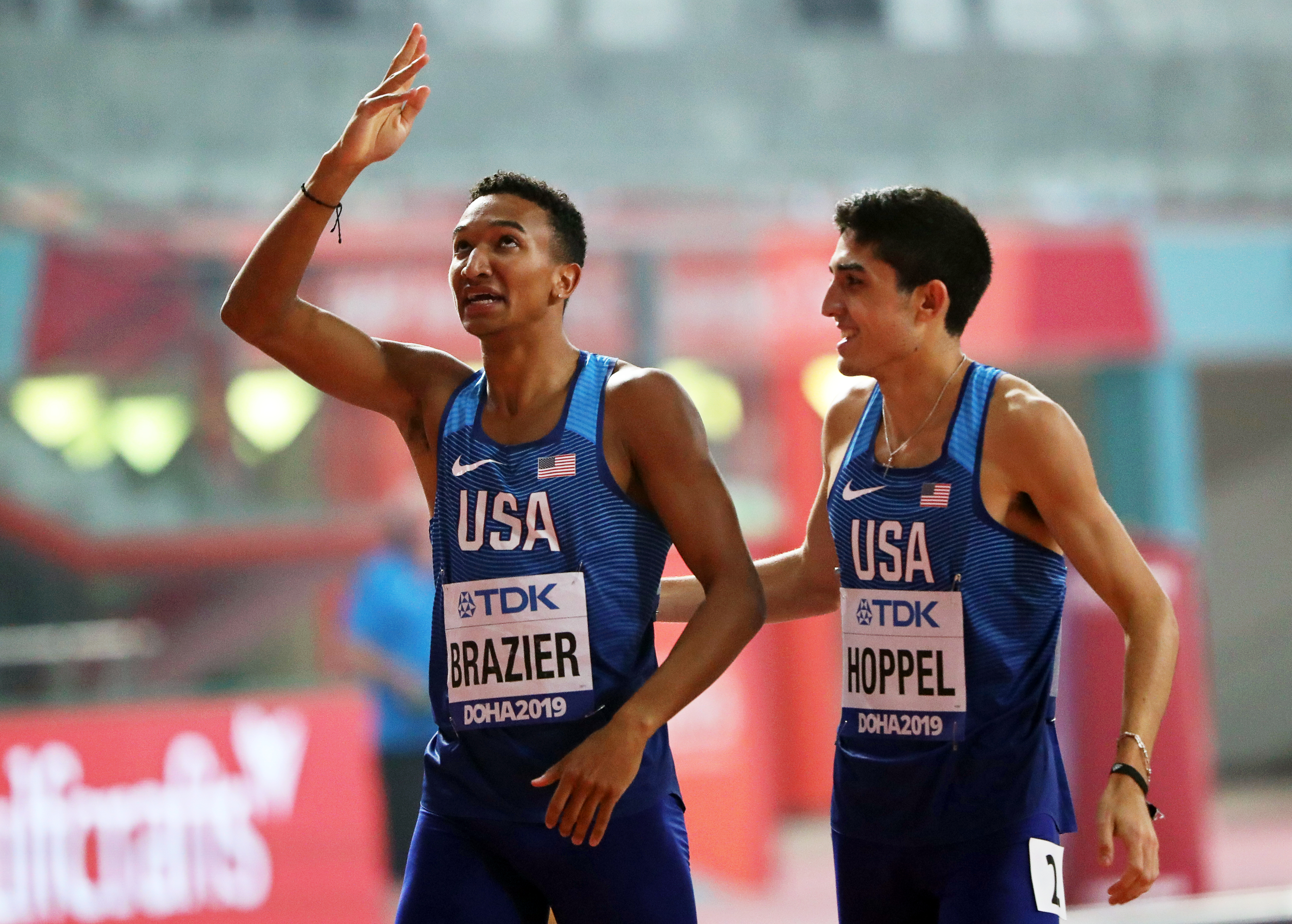 epa07887639 Donavan Brazier (L) of the USA celebrates after winning the men's 800m final at the IAAF World Athletics Championships 2019 at the Khalifa Stadium in Doha, Qatar, 01 October 2019. EPA-EFE/ALI HAIDER