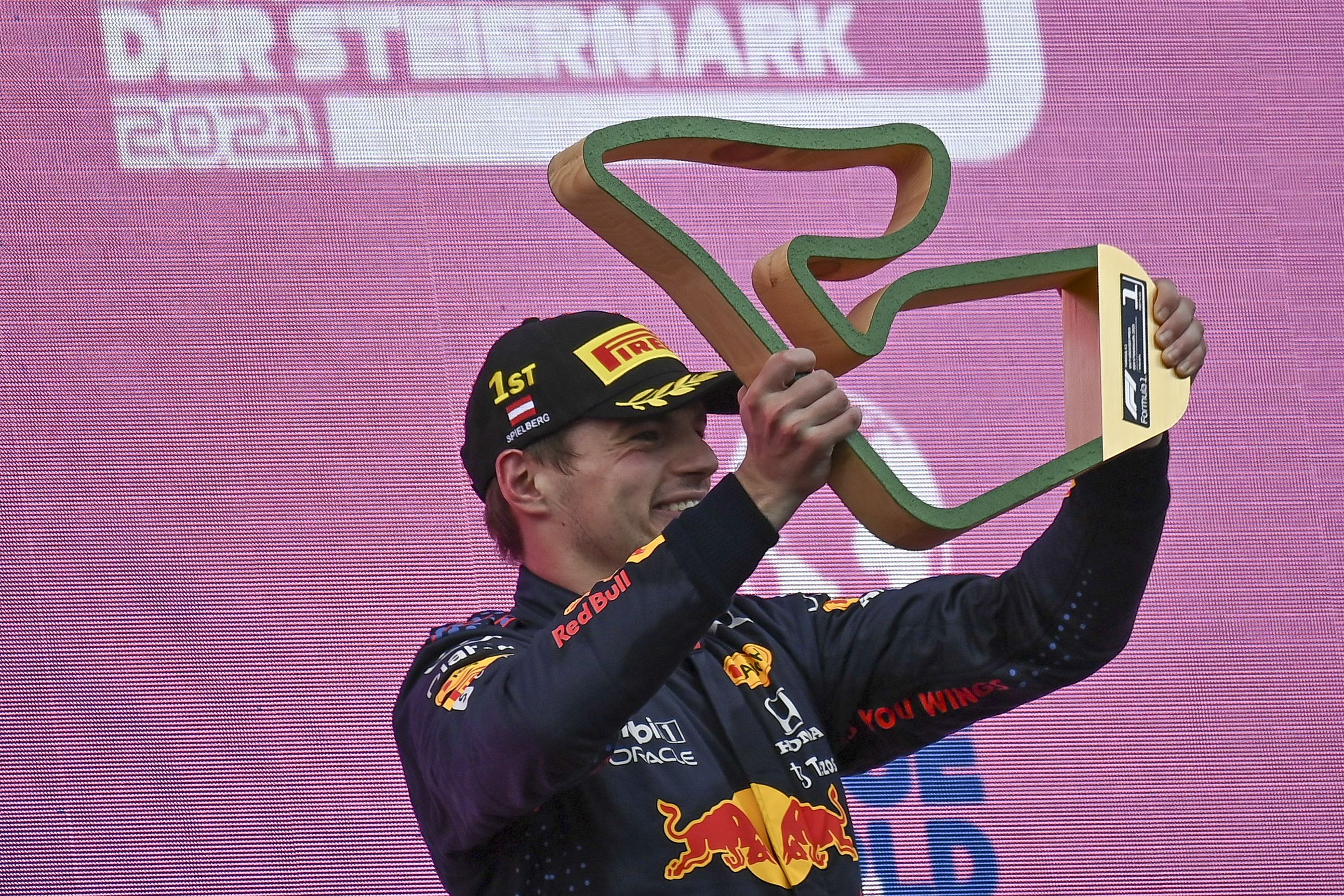 epa09305397 Dutch Formula One driver Max Verstappen of Red Bull Racing celebrates with the trophy after winning the Formula One Grand Prix of Styria at the Red Bull Ring in Spielberg, Austria, 27 June 2021.  EPA-EFE/CHRISTIAN BRUNA