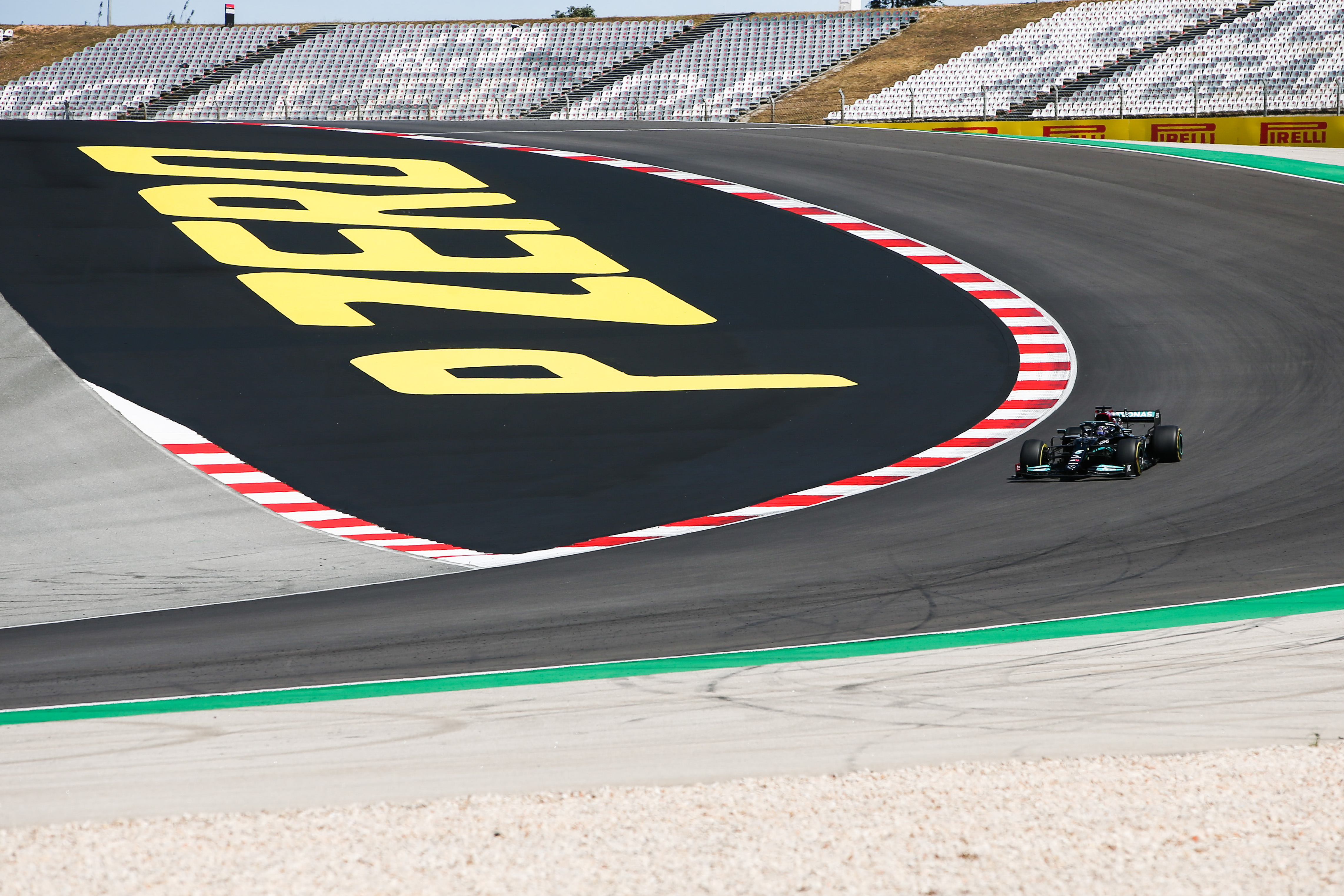 epa09174316 British Formula One driver Lewis Hamilton of Mercedes-AMG Petronas is on his way to win the 2021 Formula One Grand Prix of Portugal at the Autodromo Internacional do Algarve near Portimao, Portugal, 02 May 2021.  EPA-EFE/JOSE SENA GOULAO