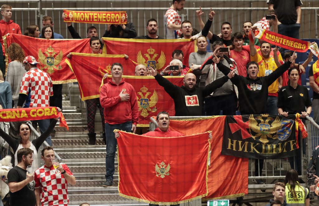 epa08120494 Montenegro fans support their team during the EHF Handball Men European Championship match between Montenegro and Serbia in Graz, Austria, 11 January 2020.  EPA-EFE/VALDRIN XHEMAJ