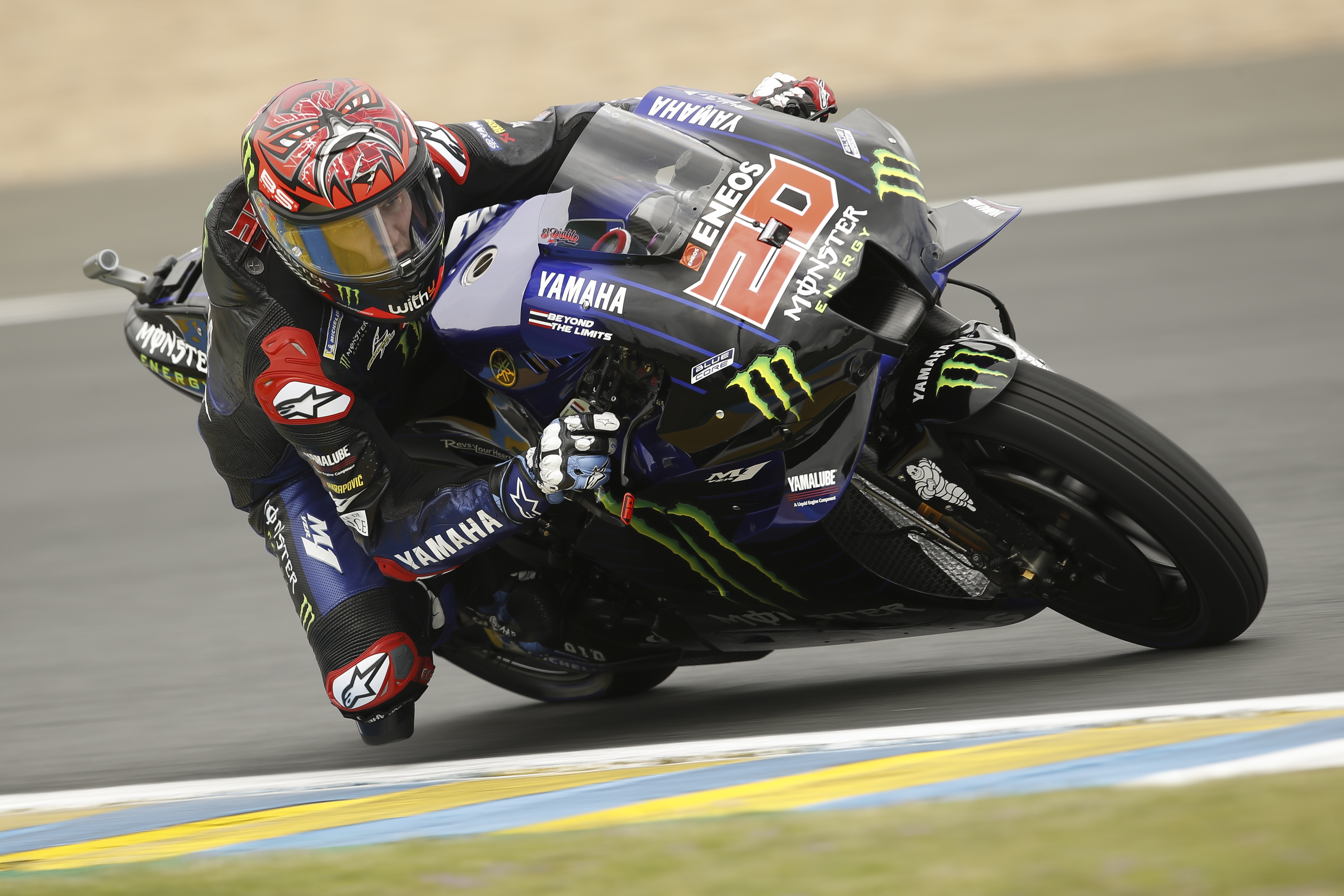 epa09201392 French MotoGP rider Fabio Quartararo of Monster Energy Yamaha MotoGP team in action during the qualifying session for the French Motorcycling Grand Prix in Le Mans, France, 15 May 2021.  EPA-EFE/YOAN VALAT