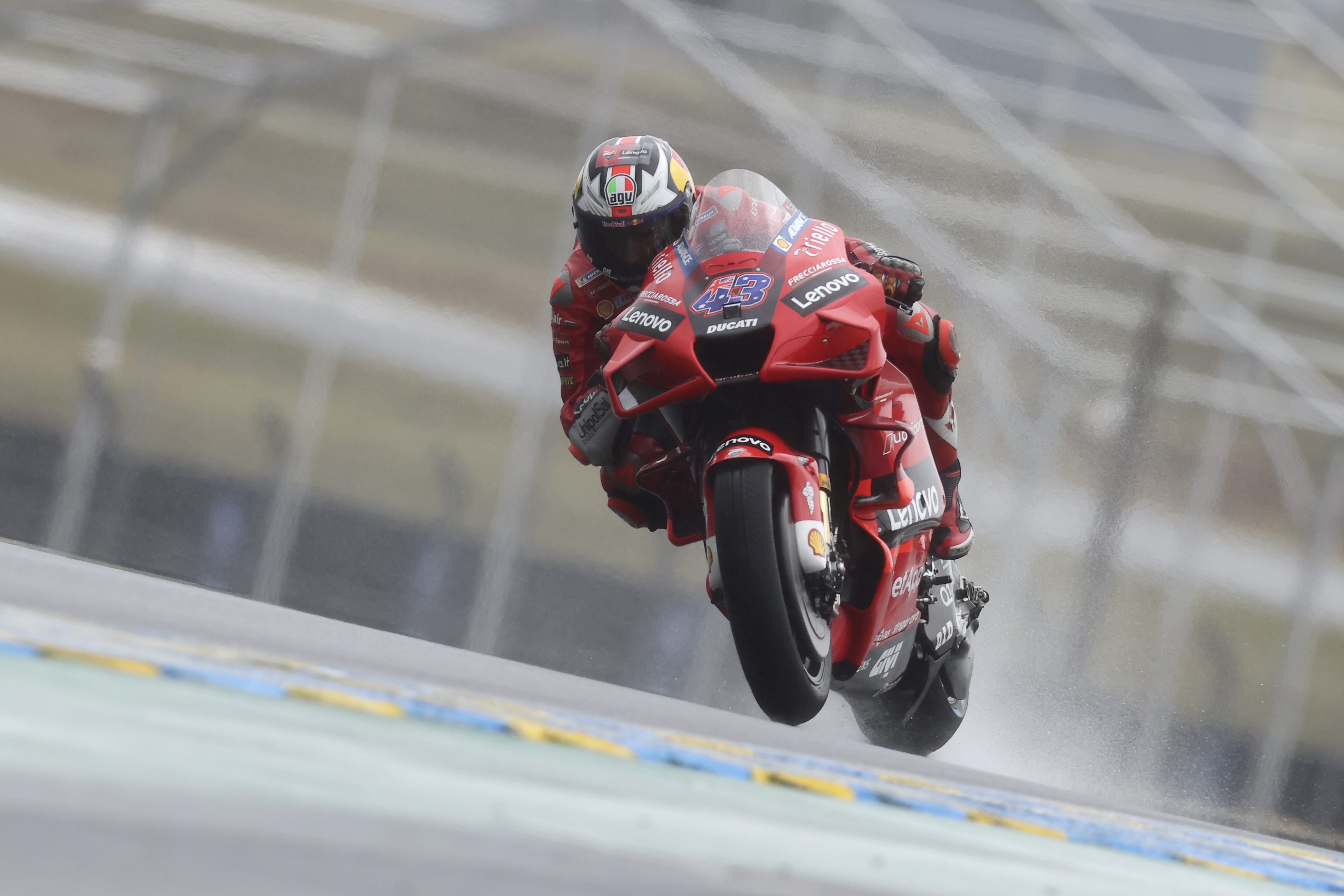 MotoGP rider Jack Miller of Australia steers his motorcycle during the French Motorcycle Grand Prix in Le Mans, France, Sunday, May 16, 2021. (AP Photo/David Vincent)