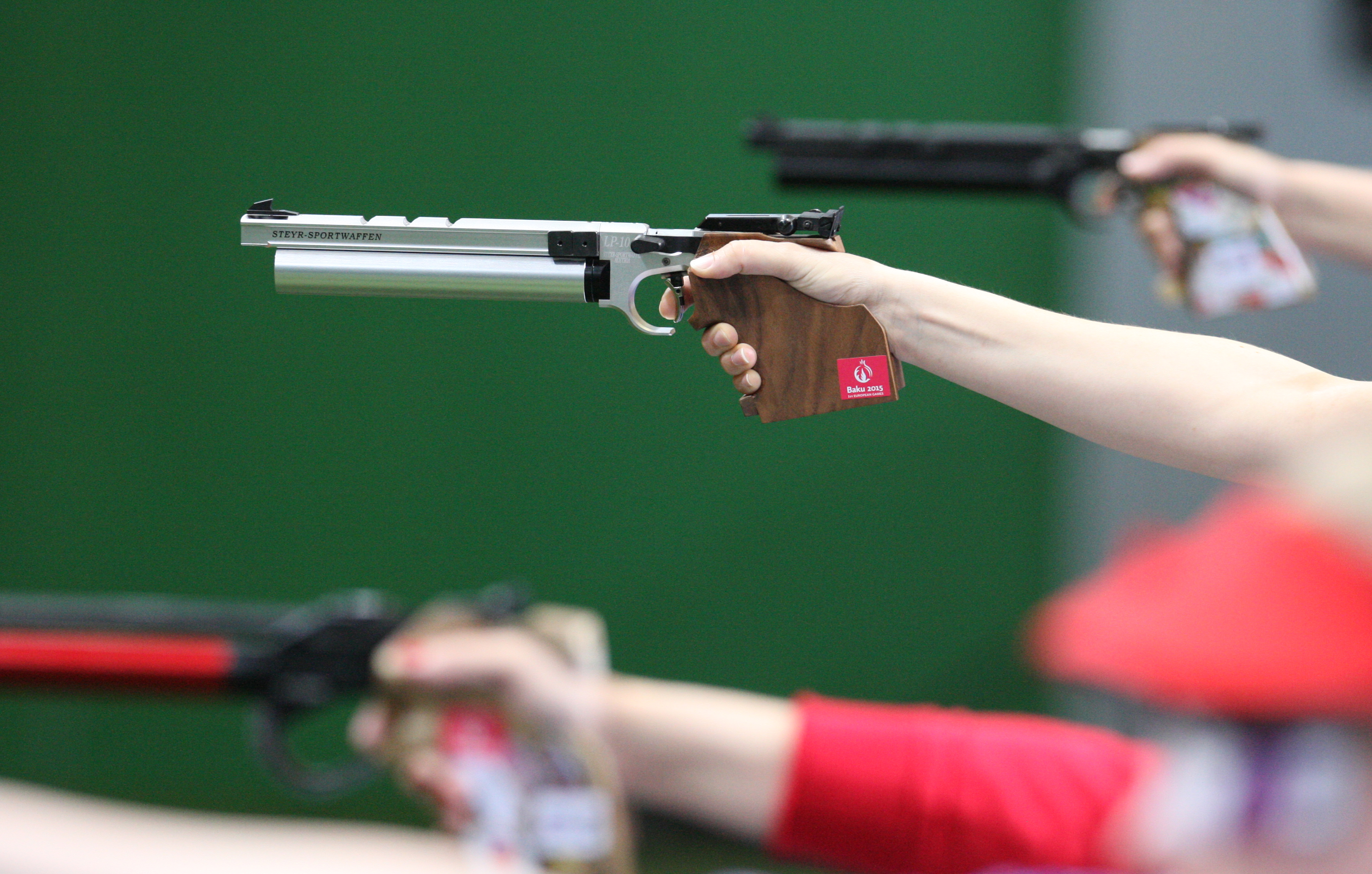 epa04803982 Athletes compete in the Women's 10m Air Pistol final in the Baku Shooting Centre at the Baku 2015 European Games in Baku, Azerbaijan, 17 June 2015. Arunovic won gold.  EPA/ZURAB KURTSIKIDZE