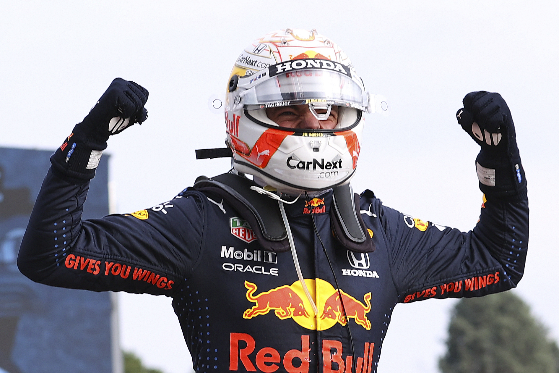 epa09143679 Dutch Formula One driver Max Verstappen of Red Bull Racing celebrates after winning the Formula One Grand Prix Emilia Romagna at Imola race track, Italy, 18 April 2021.  EPA-EFE/Bryn Lennon / POOL