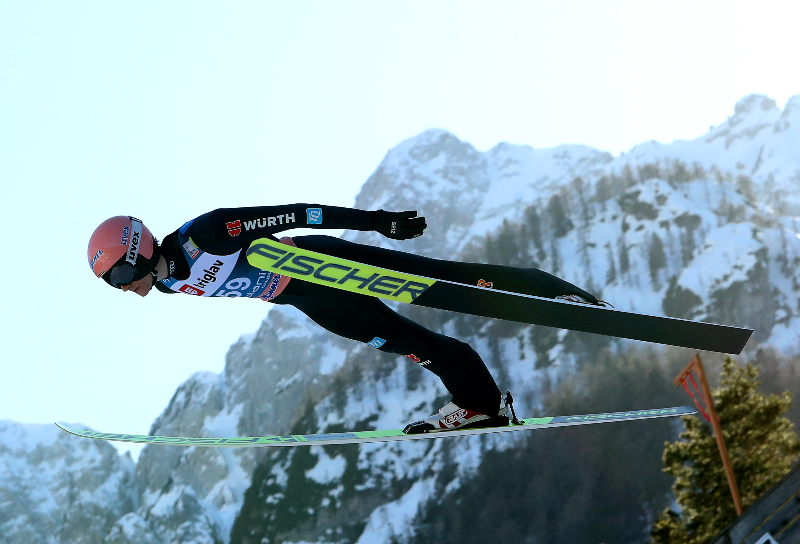 epa09093710 Karl Geiger of Germany in action during the training session for the Large Hill individual competition of the FIS Ski Jumping World Cup in Planica, Slovenia, 24 March 2021.  EPA-EFE/Grzegorz Momot POLAND OUT