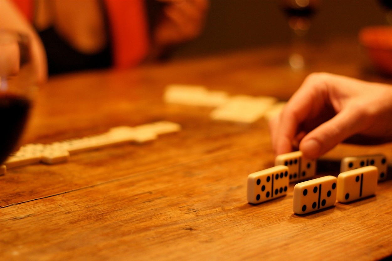 Dominoes on wooden table,Image: 316640701, License: Royalty-free, Restrictions: , Model Release: no, Credit line: Simon Thomas / Alamy / Alamy / Profimedia