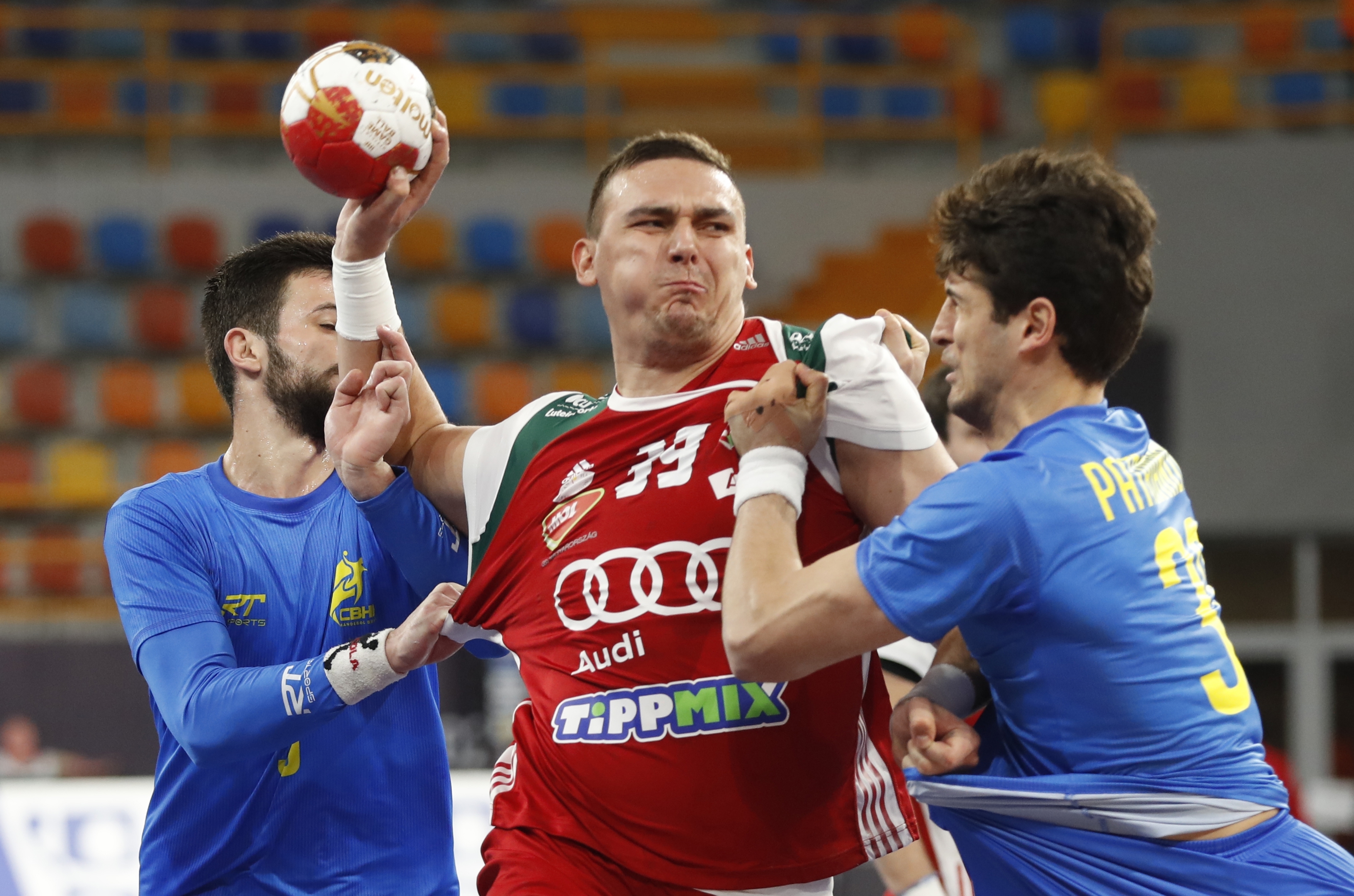 Hungary's Richard Bodo tries to throw during the World Handball Championship between Hungary and Brazil, in Cairo, Egypt, Thursday, Jan. 21, 2021. (AP Photo/Petr David Josek, Pool)