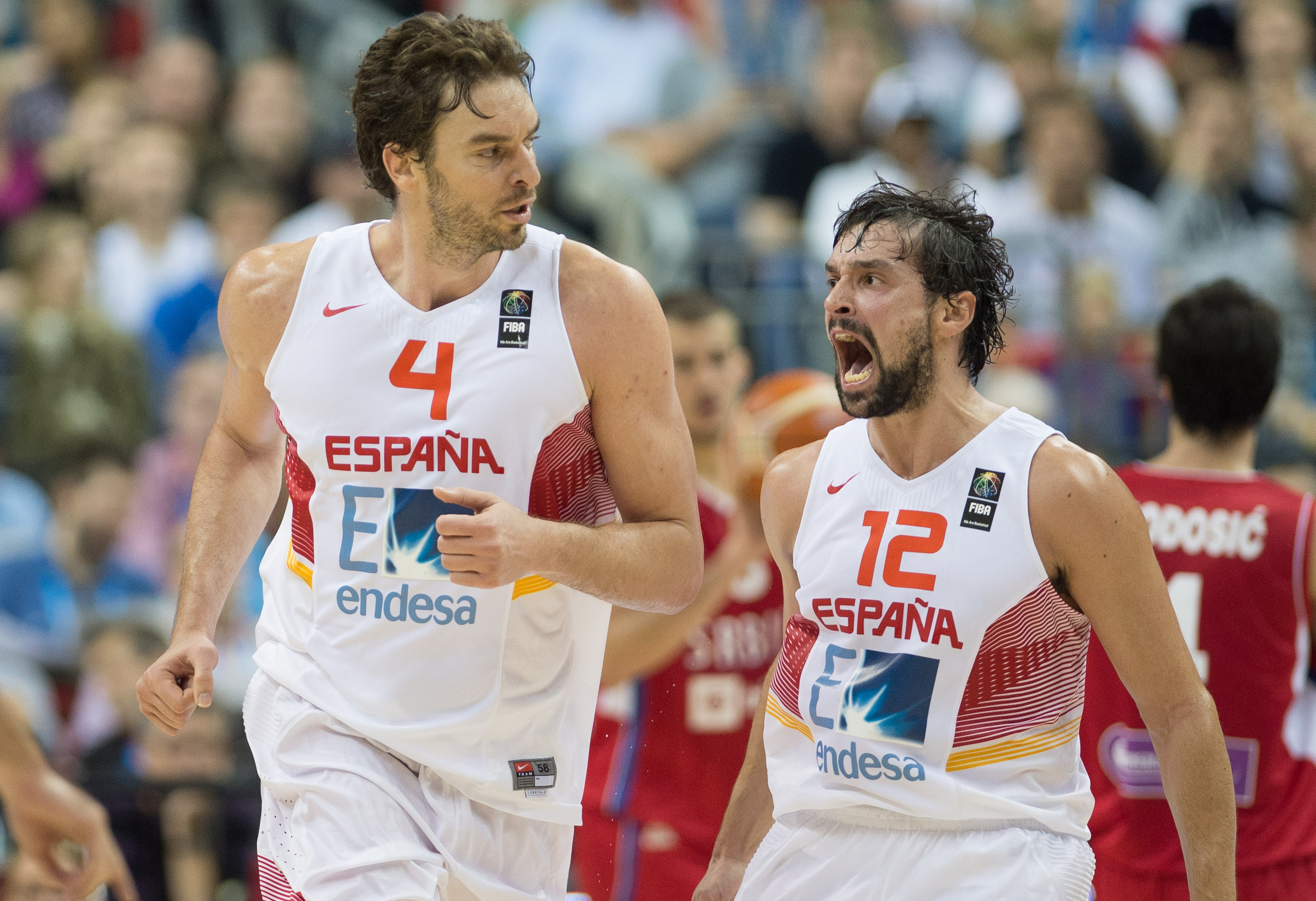 epa04915297 Spain's Sergio Llull (R) and Pau Gasol (L) react during the FIBA EuroBasket 2015 Group B match between Spain and Serbia at the Mercedes-Benz-Arena in Berlin, Germany, 05 September 2015.  EPA/LUKAS SCHULZE
