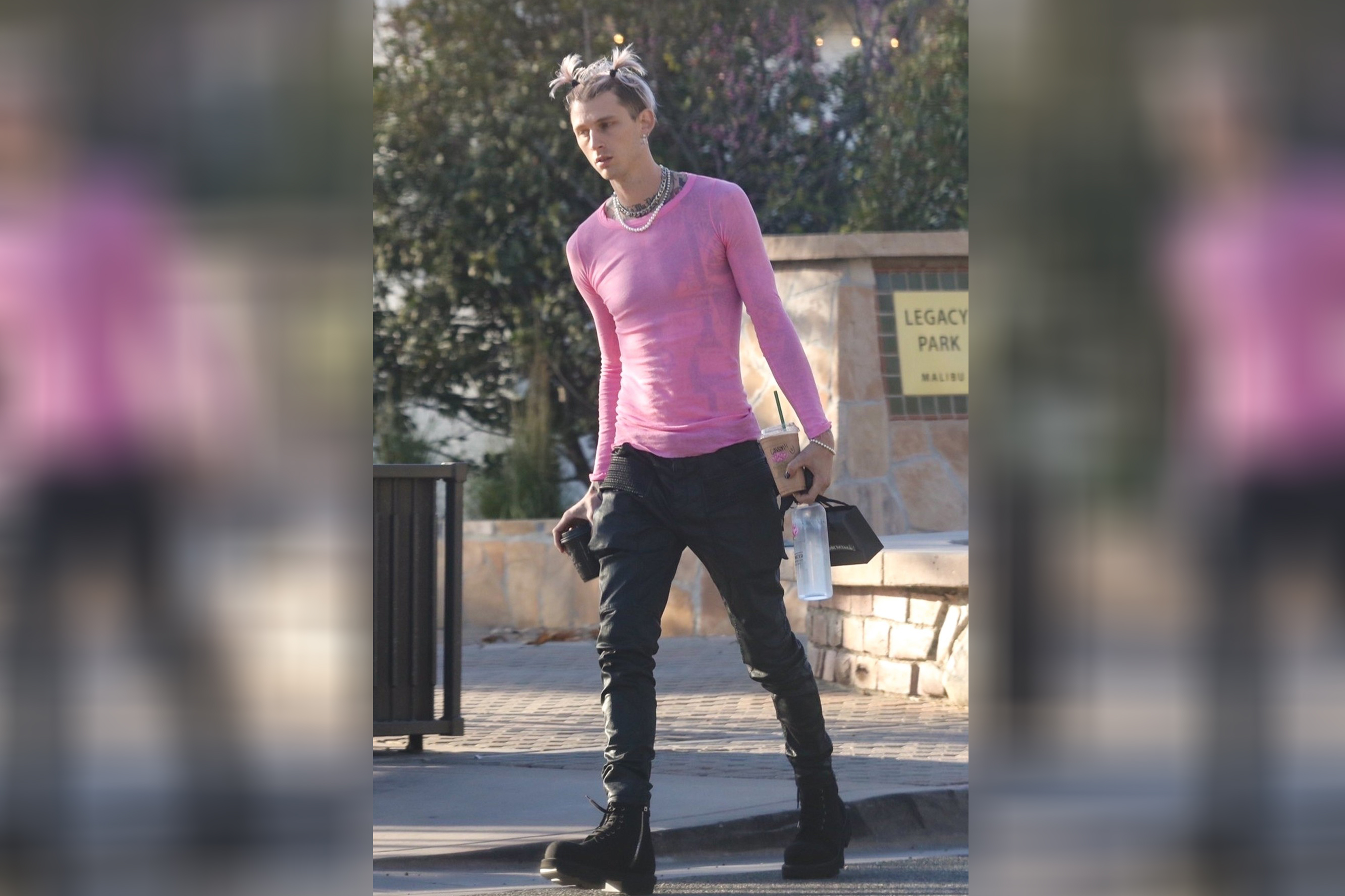 *EXCLUSIVE* Machine Gun Kelly supports International Women's Day with pink top!