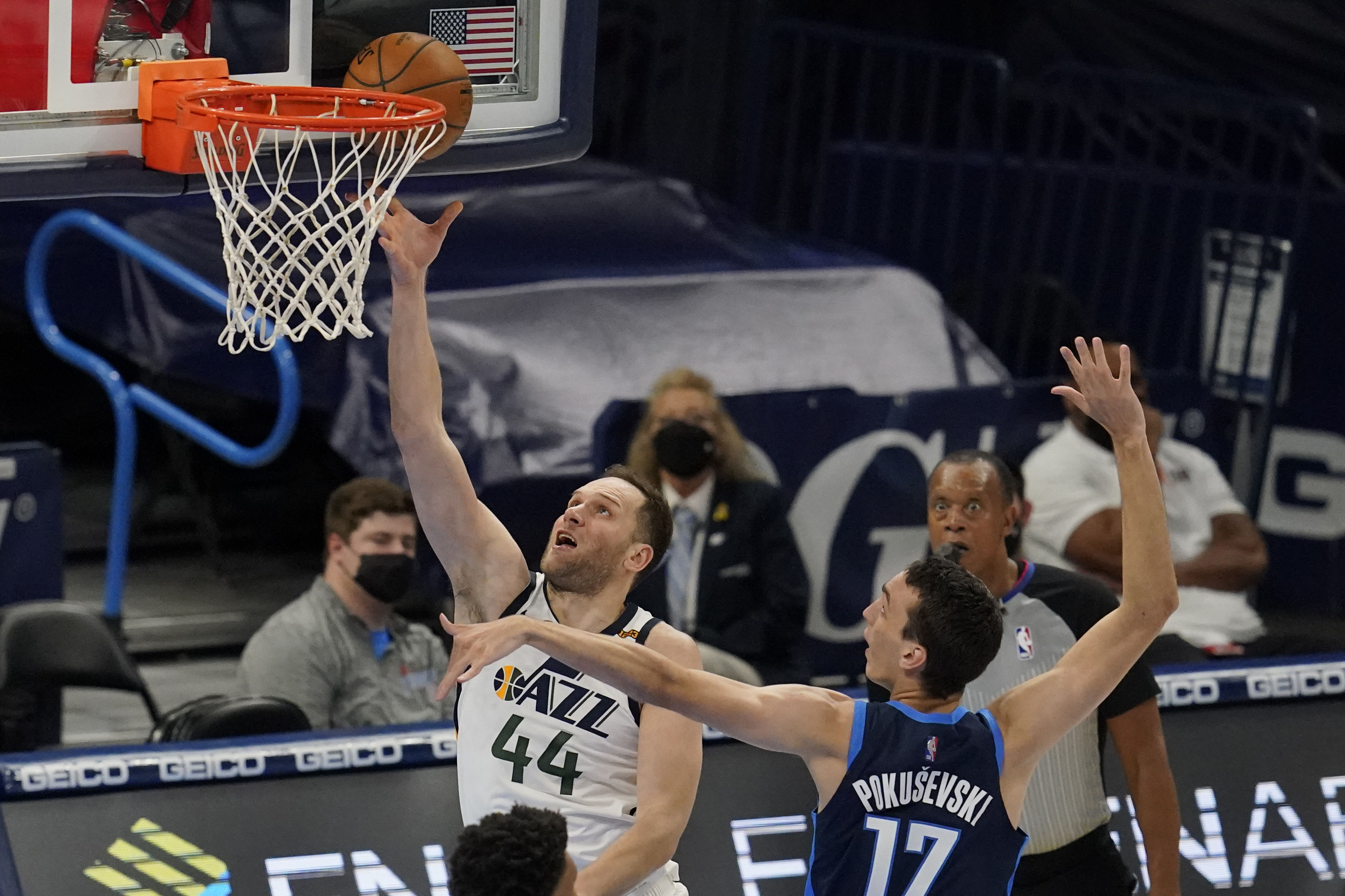 Utah Jazz forward Bojan Bogdanovic (44) shoots in front of Oklahoma City Thunder forward Aleksej Pokusevski (17) in the second half of an NBA basketball game Friday, May 14, 2021, in Oklahoma City. (AP Photo/Sue Ogrocki)