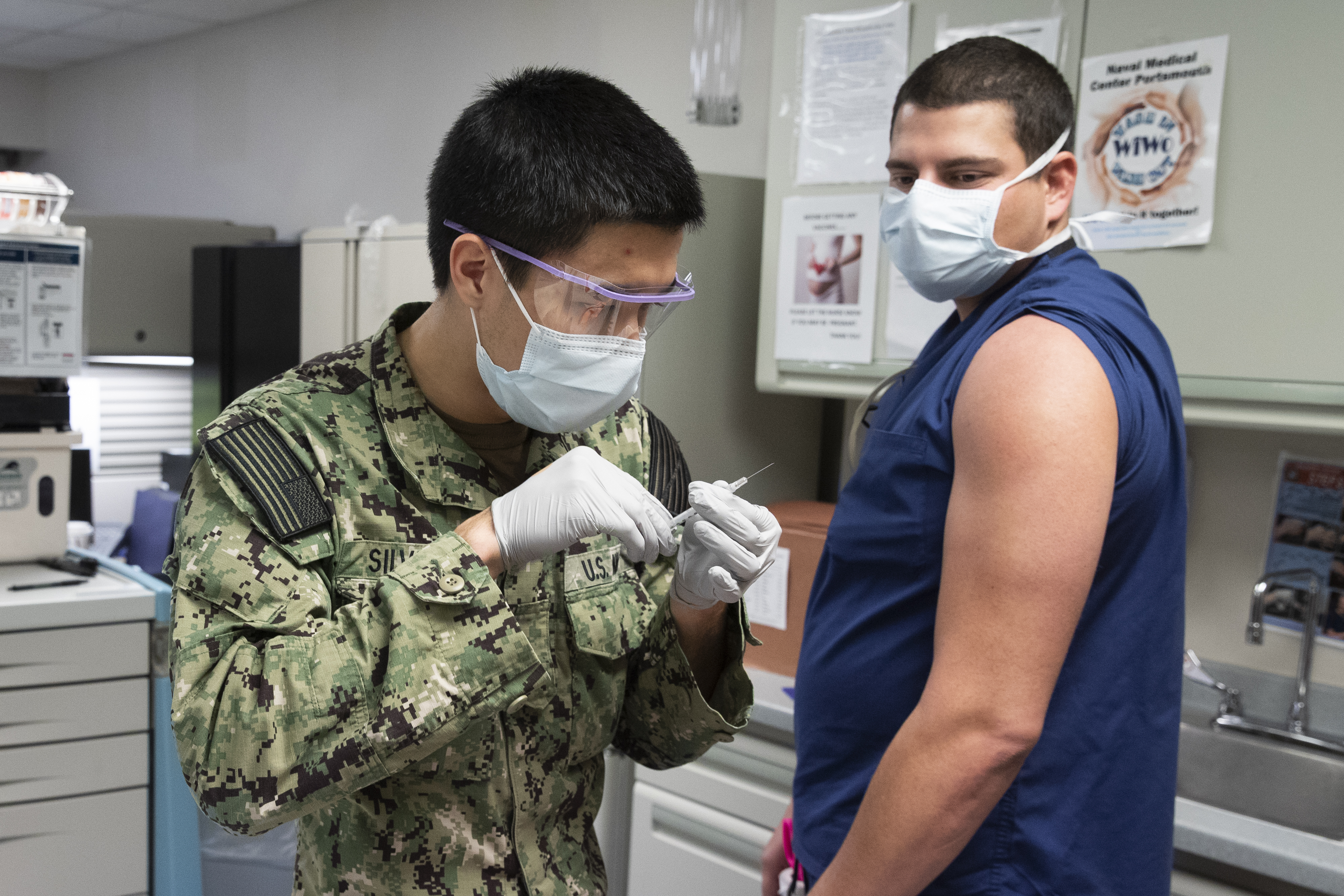 Pfizer-BioNTech COVID-19 vaccine is administered at Naval Medical Center Portsmouth (NMCP) in Portsmouth, Virginia