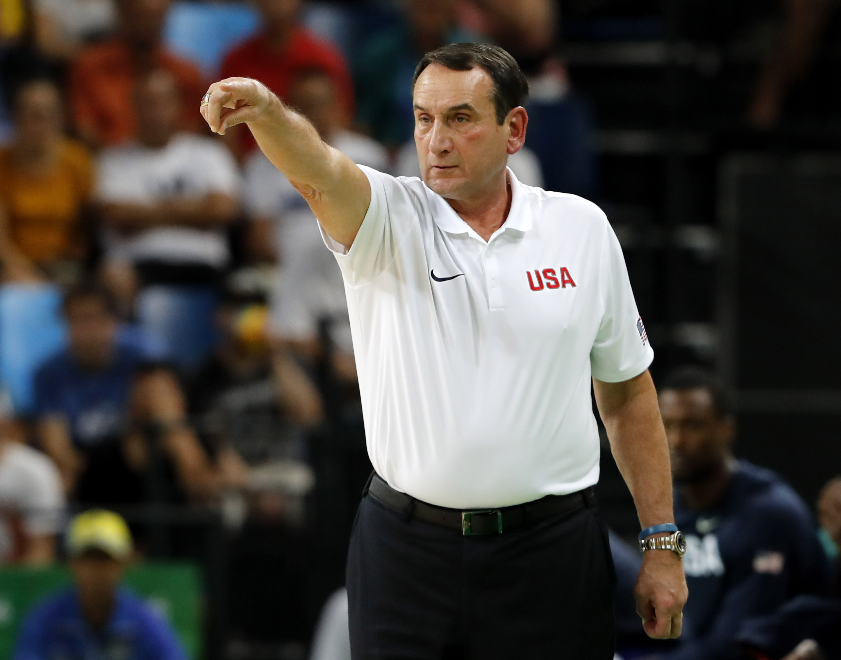 epa05499948 Coach Mike Krzyzewski of the USA  reacts during the men's semifinal basketball game of the Rio 2016 Olympic Games between Spain and the USA at the Carioca Arena 1 in the Olympic Park in Rio de Janeiro, Brazil, 19 August 2016.  EPA/JORGE ZAPATA