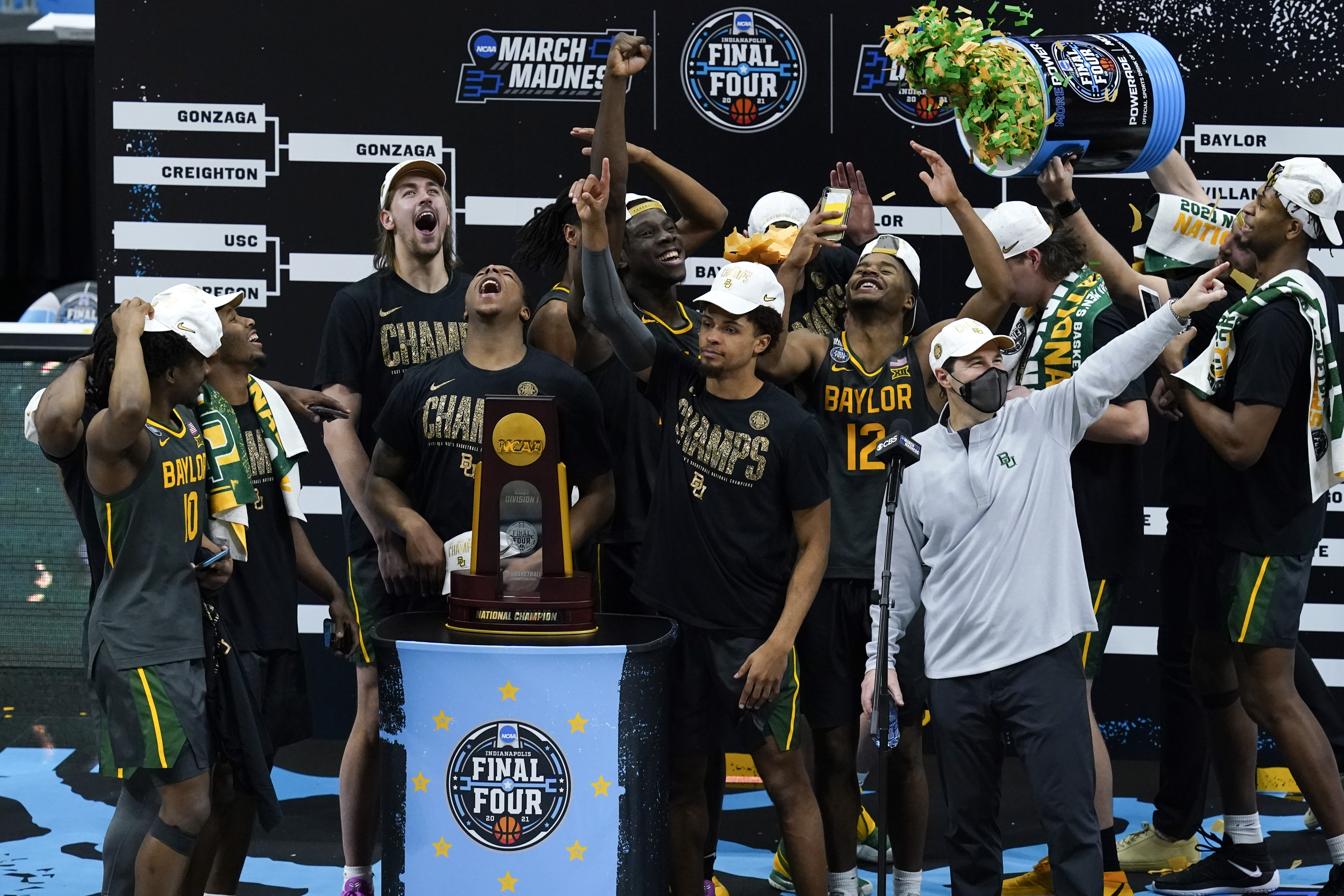Baylor players and coaches celebrate after the championship game against Gonzaga in the men's Final Four NCAA college basketball tournament, Monday, April 5, 2021, at Lucas Oil Stadium in Indianapolis. Baylor won 86-70. (AP Photo/Darron Cummings)