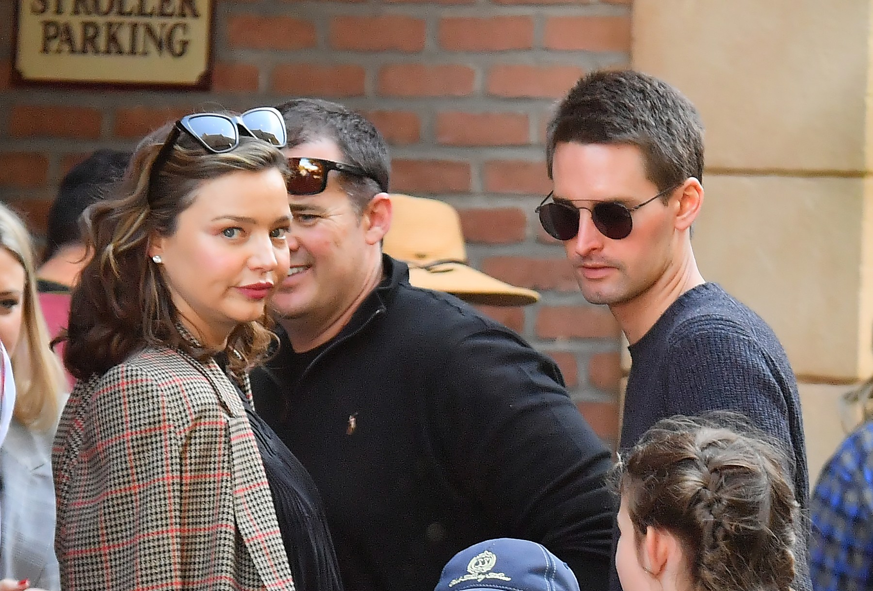 EXCLUSIVE: Pregnant Miranda Kerr and her husband Evan Spiegel spend the day with her son at the happiest place on earth